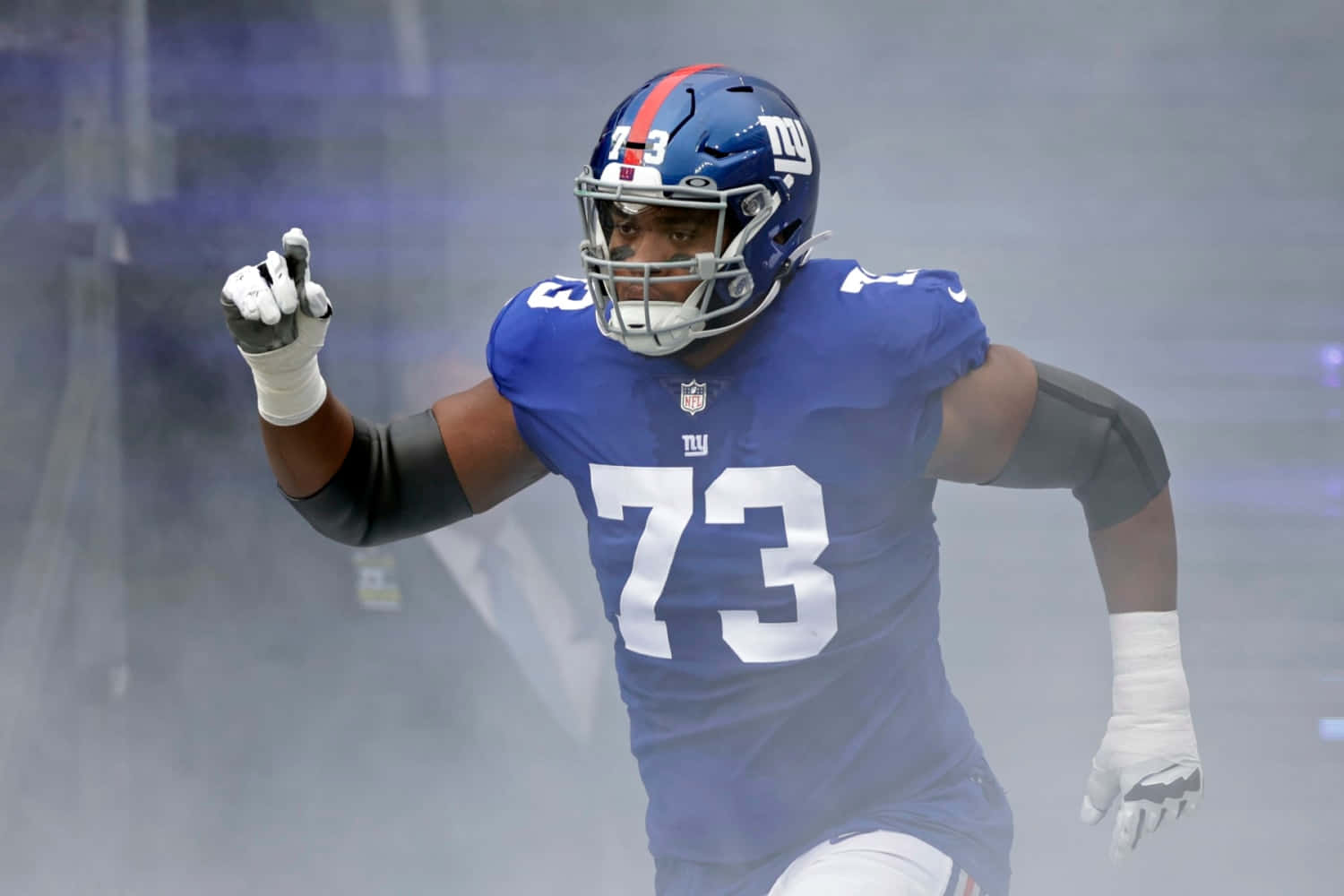 Evan Neal Team Defender Background
