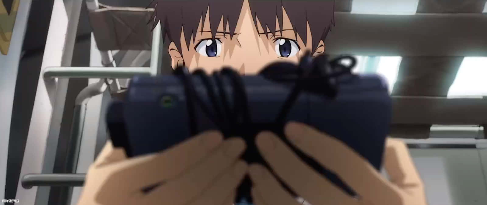 Evangelion 30 10 Shinji Holding A Device Background