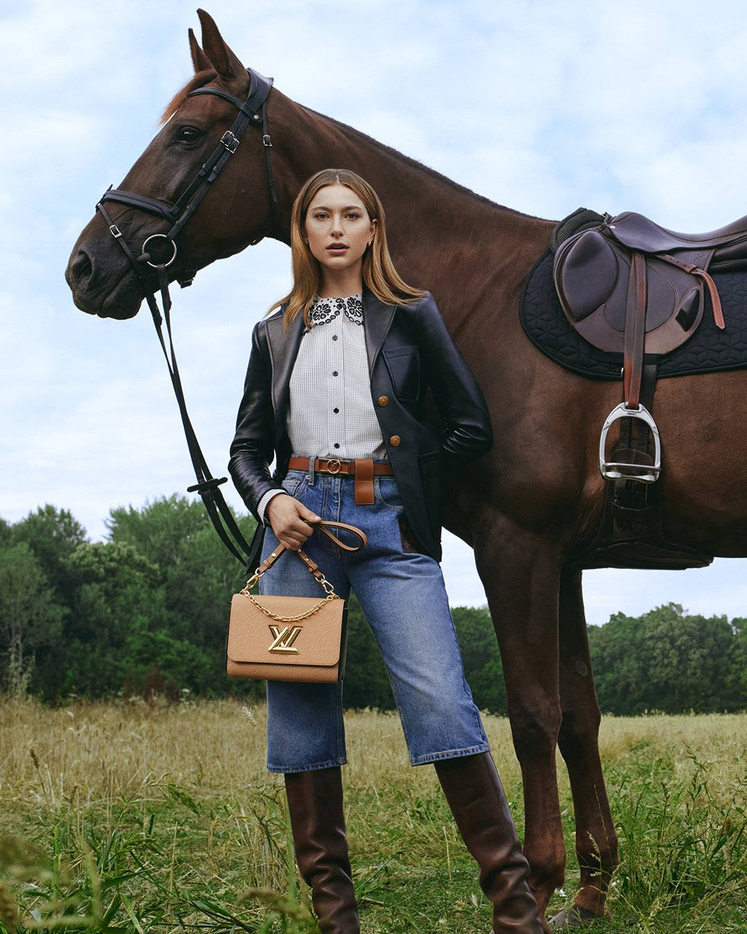 Eve Jobs Riding A Brown Horse