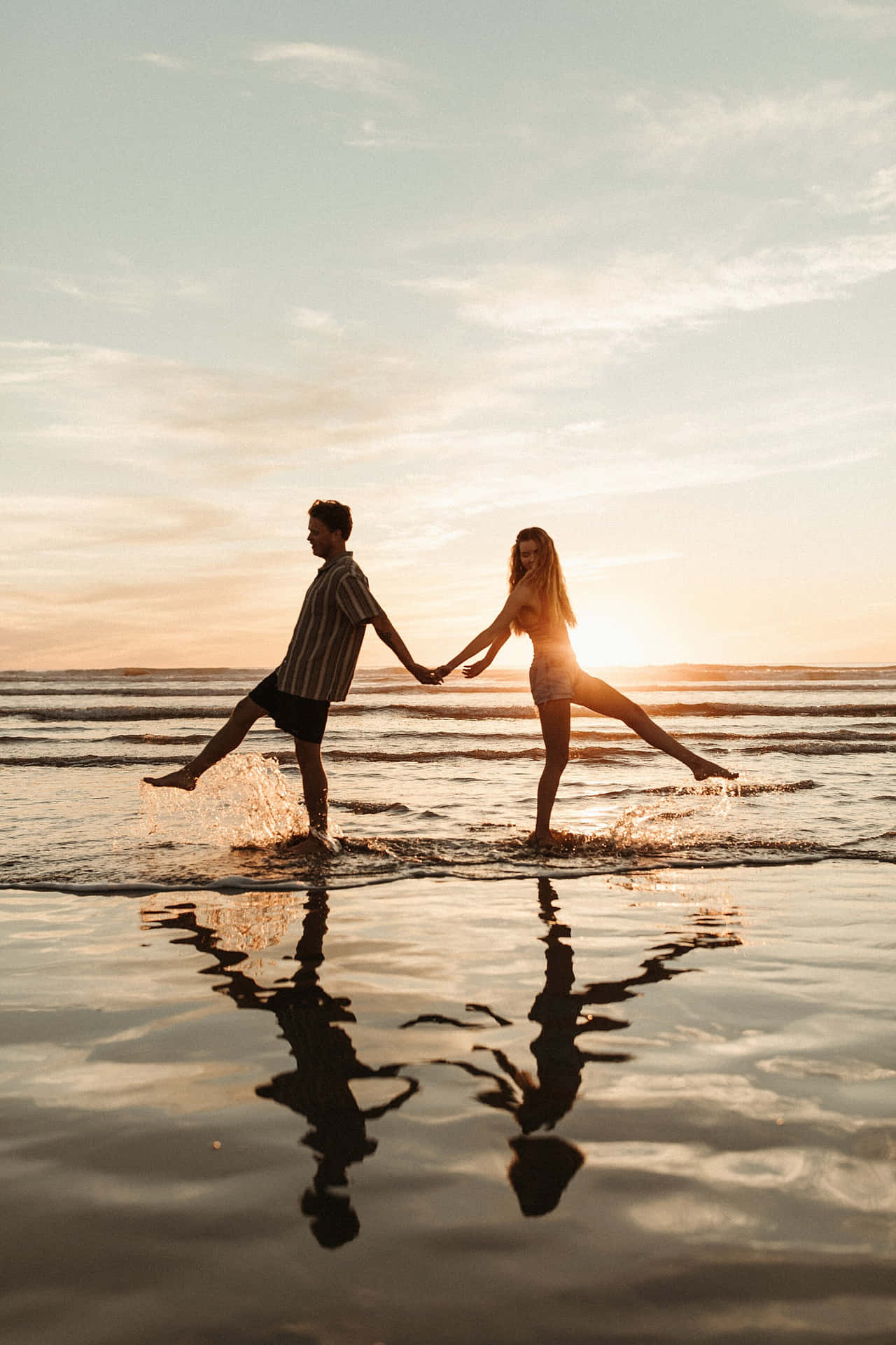 Evening Surf Couple At Beach Background