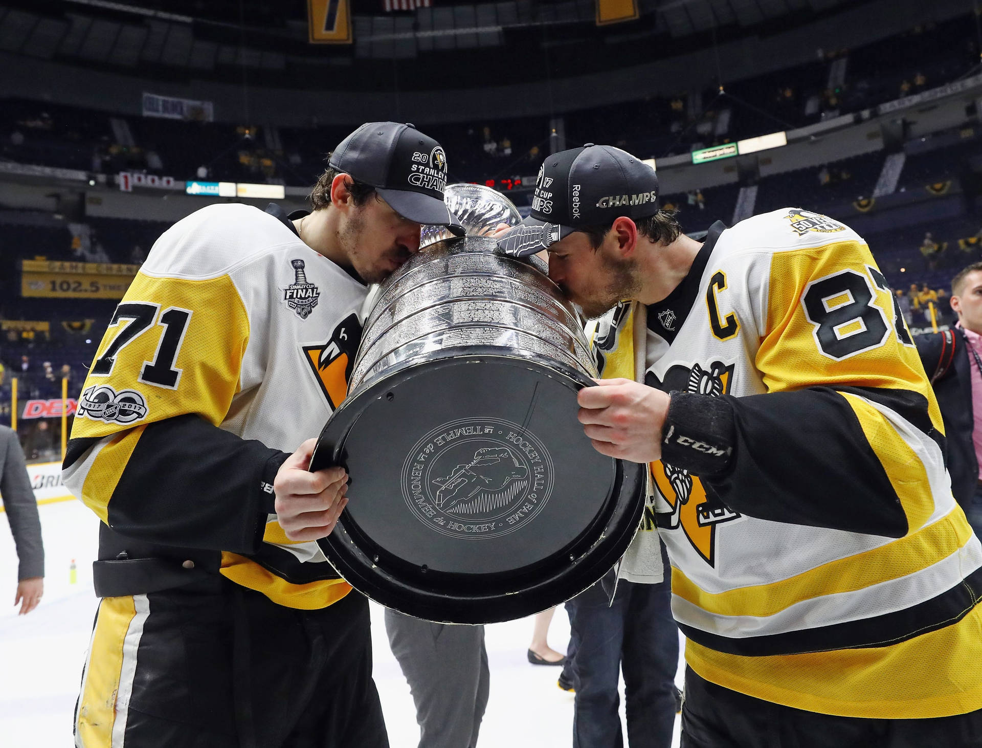 Evgeni Malkin Kissing Stanley Cup Trophy Background