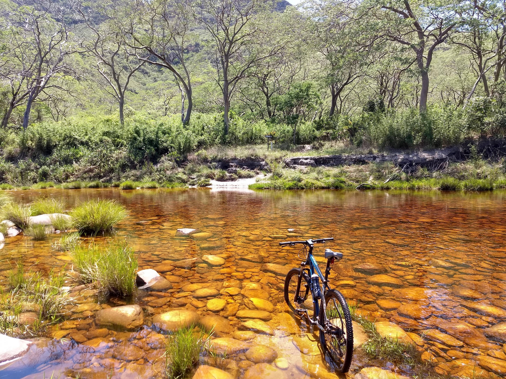 Evoke Mountain Bike At River Background