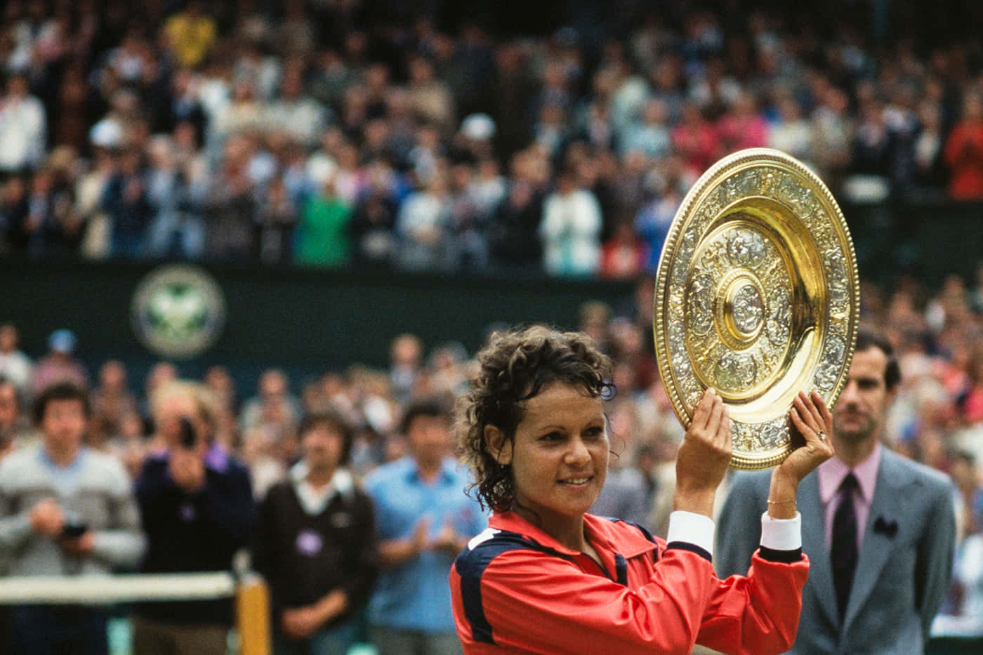 Evonne Goolagong Cawley Holding Wimbledon Trophy Background