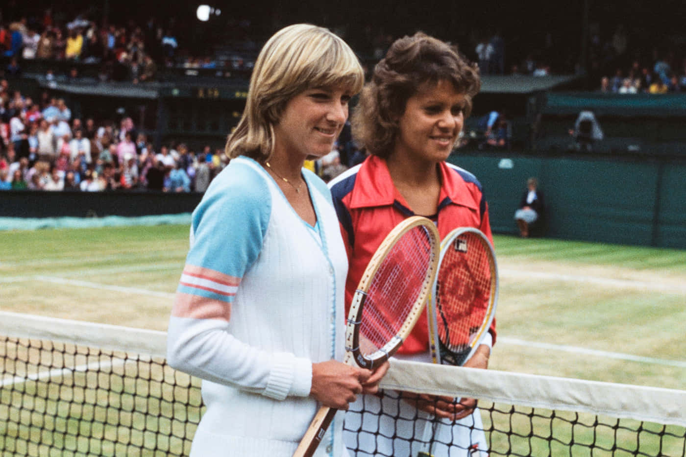 Evonne Goolagong Cawley With Chris Evert Background