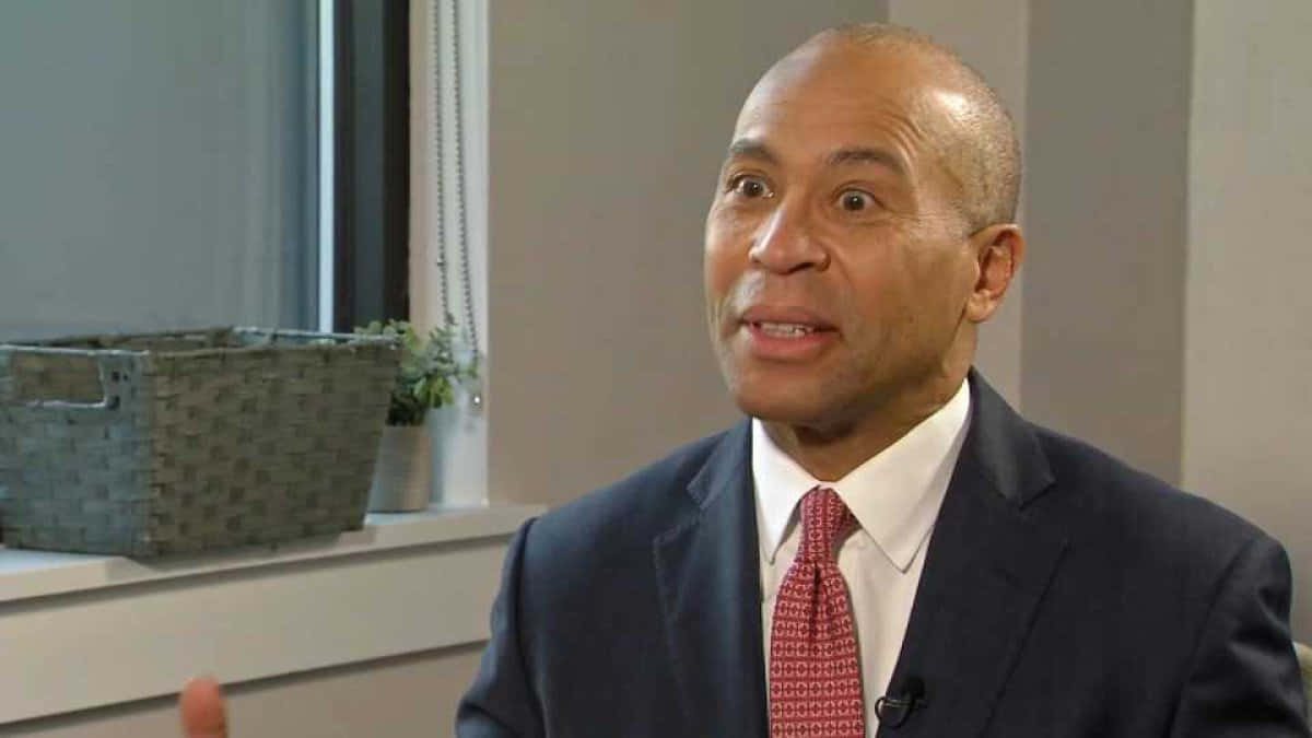 Ex-governor Deval Patrick Engaged In A Deep Conversation Background