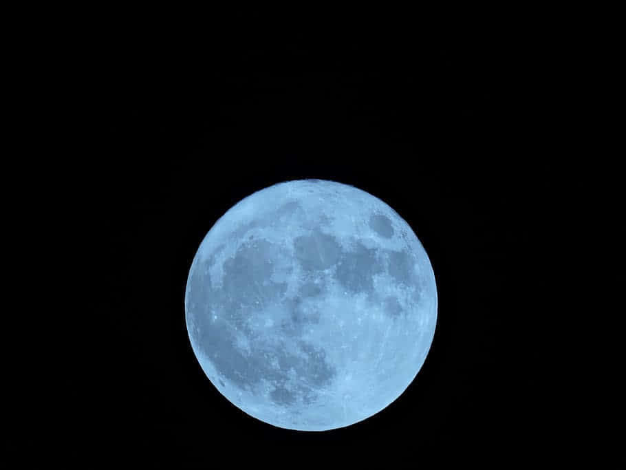 Exceptional Full Moon Illuminating The Night Sky Background