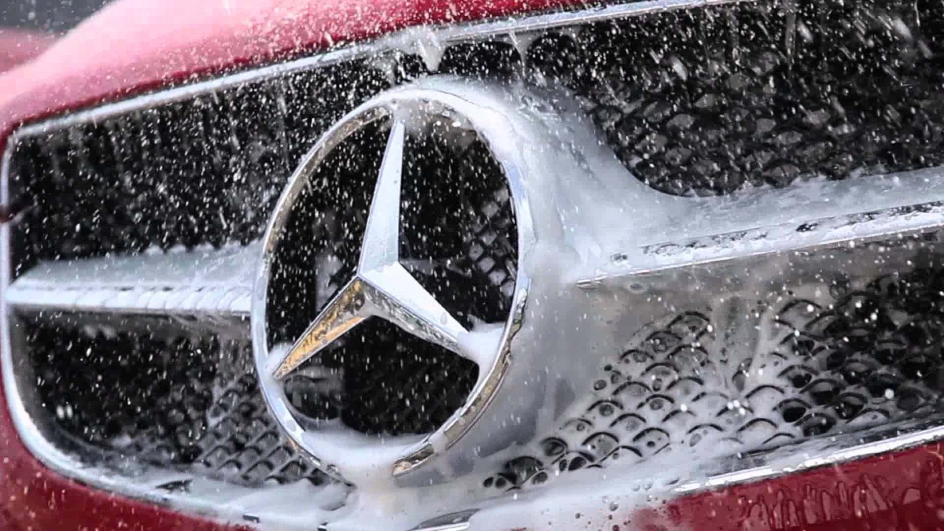 Exceptional Red Mercedes Undergoing Professional Car Detailing Background