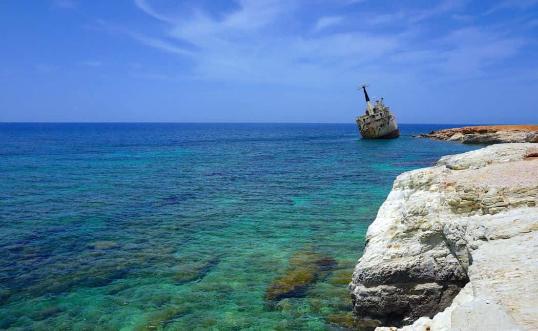 Exceptionally Clean Water In Paphos Beach Background