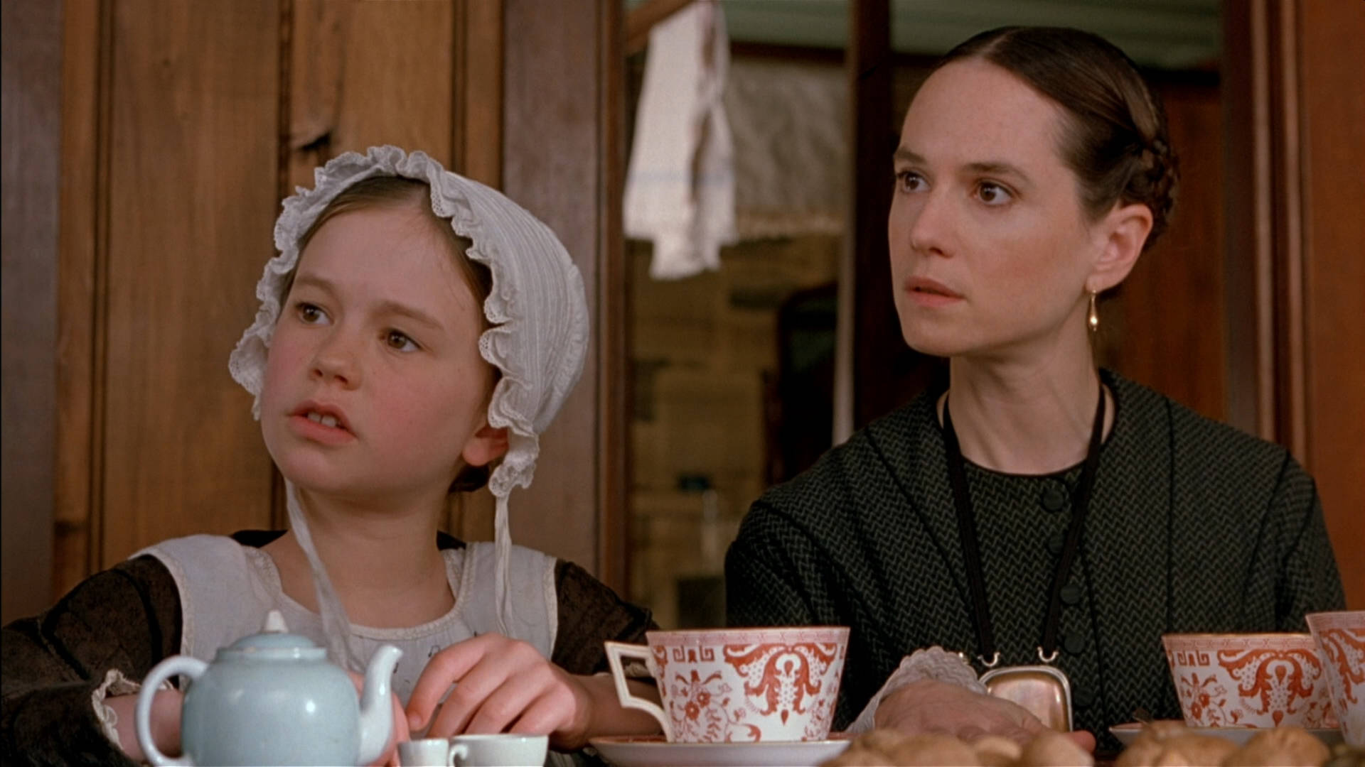 Exceptionally Talented Holly Hunter Alongside Anna Paquin In A Still From The Movie 'the Piano' Background