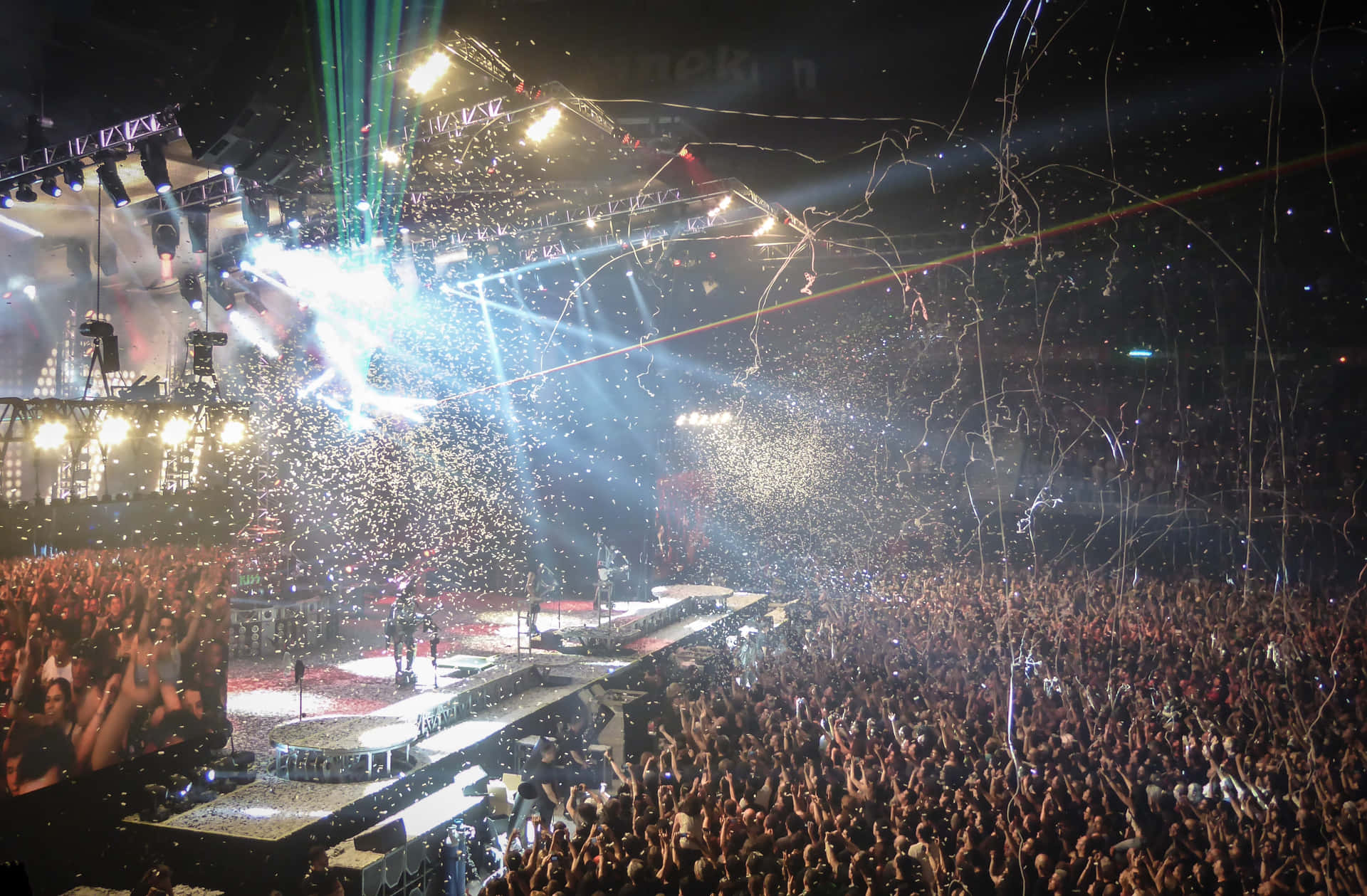 Excited Crowd Enjoying Live Performances At Music Festival Background