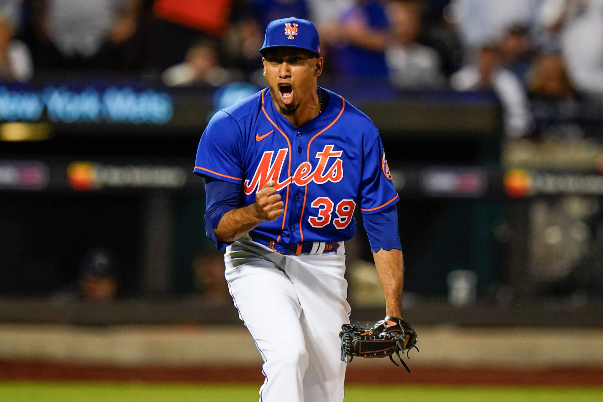 Excited Edwin Diaz In Blue Jersey Background