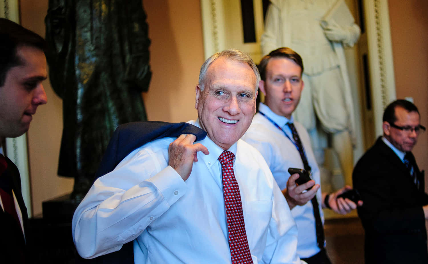 Excited Jon Kyl Background