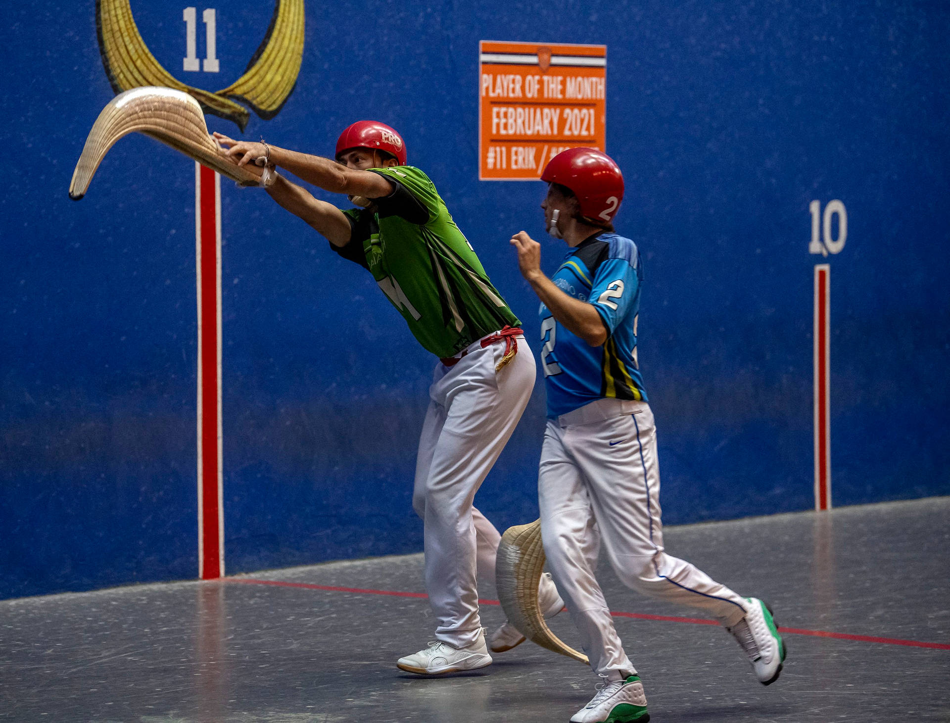 Exciting Action In Jai Alai Match Background