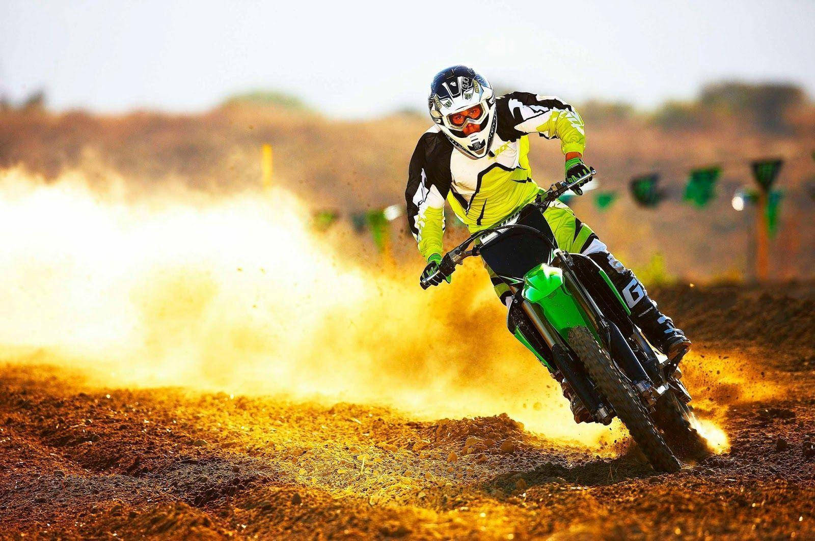 Exciting Action Shot Of Monster Dirt Bike Adventure Background