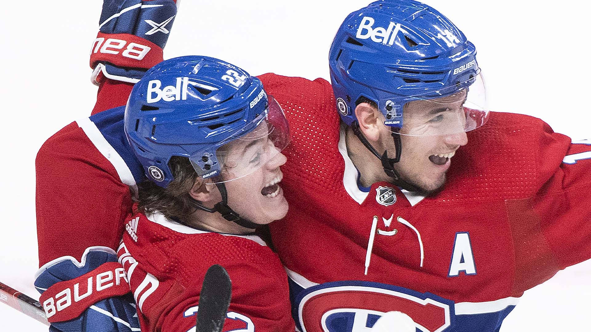 Exciting Celebration Moment Of Cole Caufield And Nick Suzuki Background