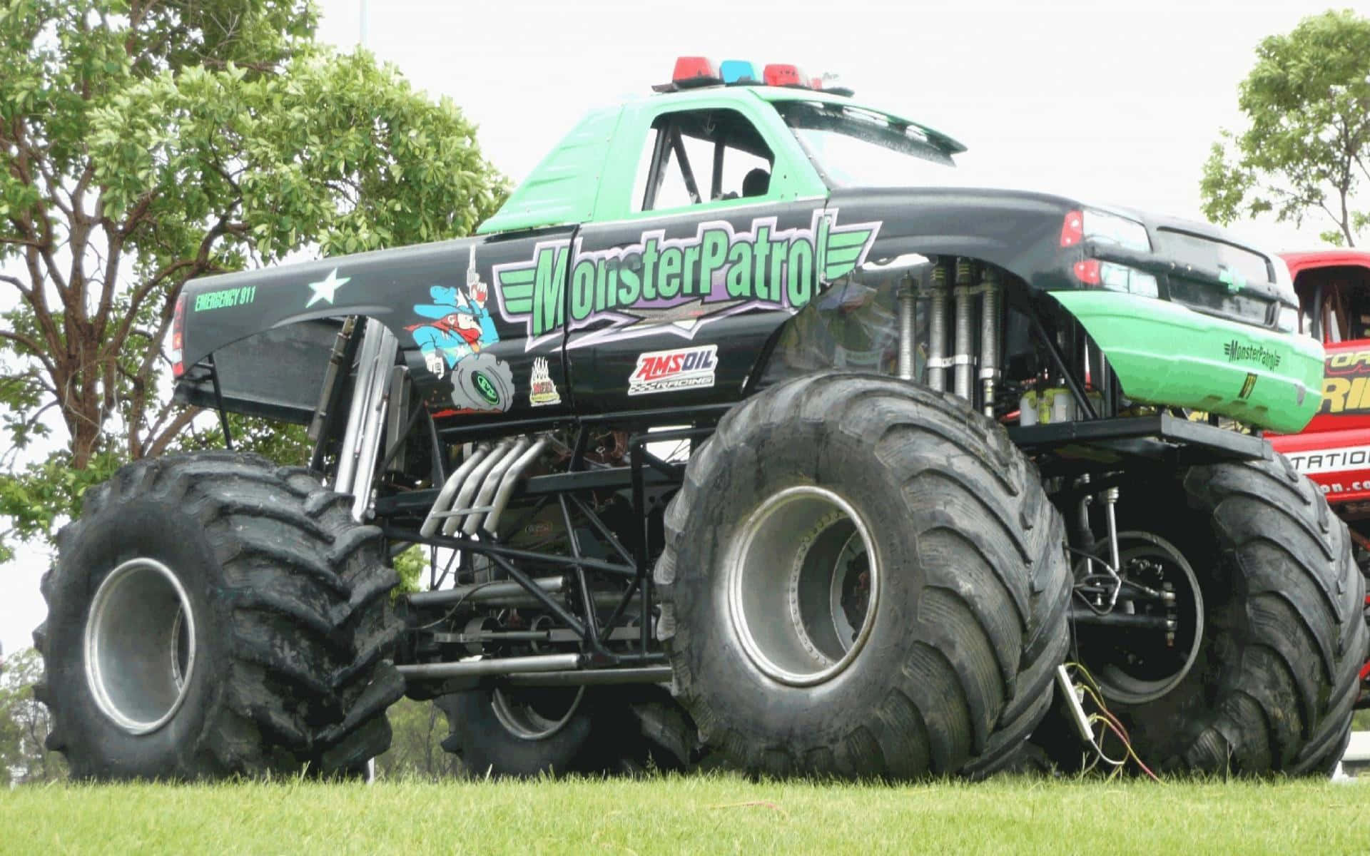 Exciting Off-road Adventure With Monster Truck Background