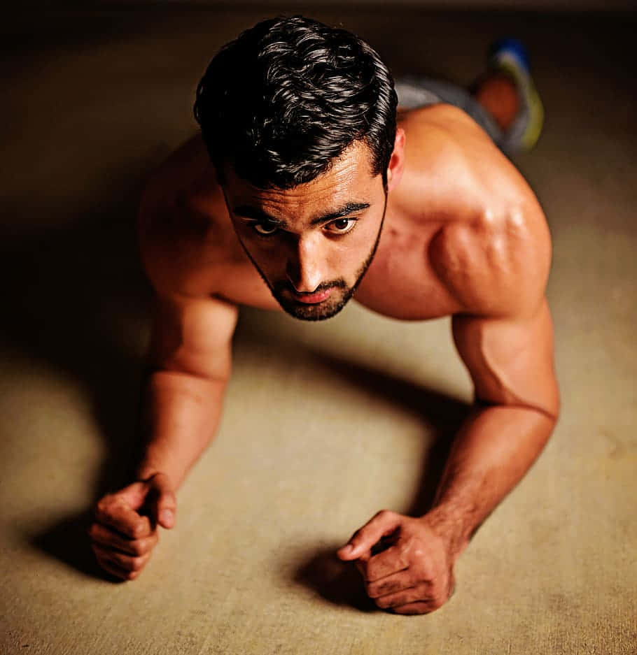 Exercising Fit Topless Indian Guy Background