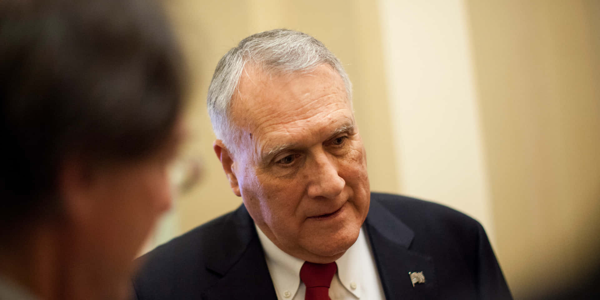 Exhausted Jon Kyl Background