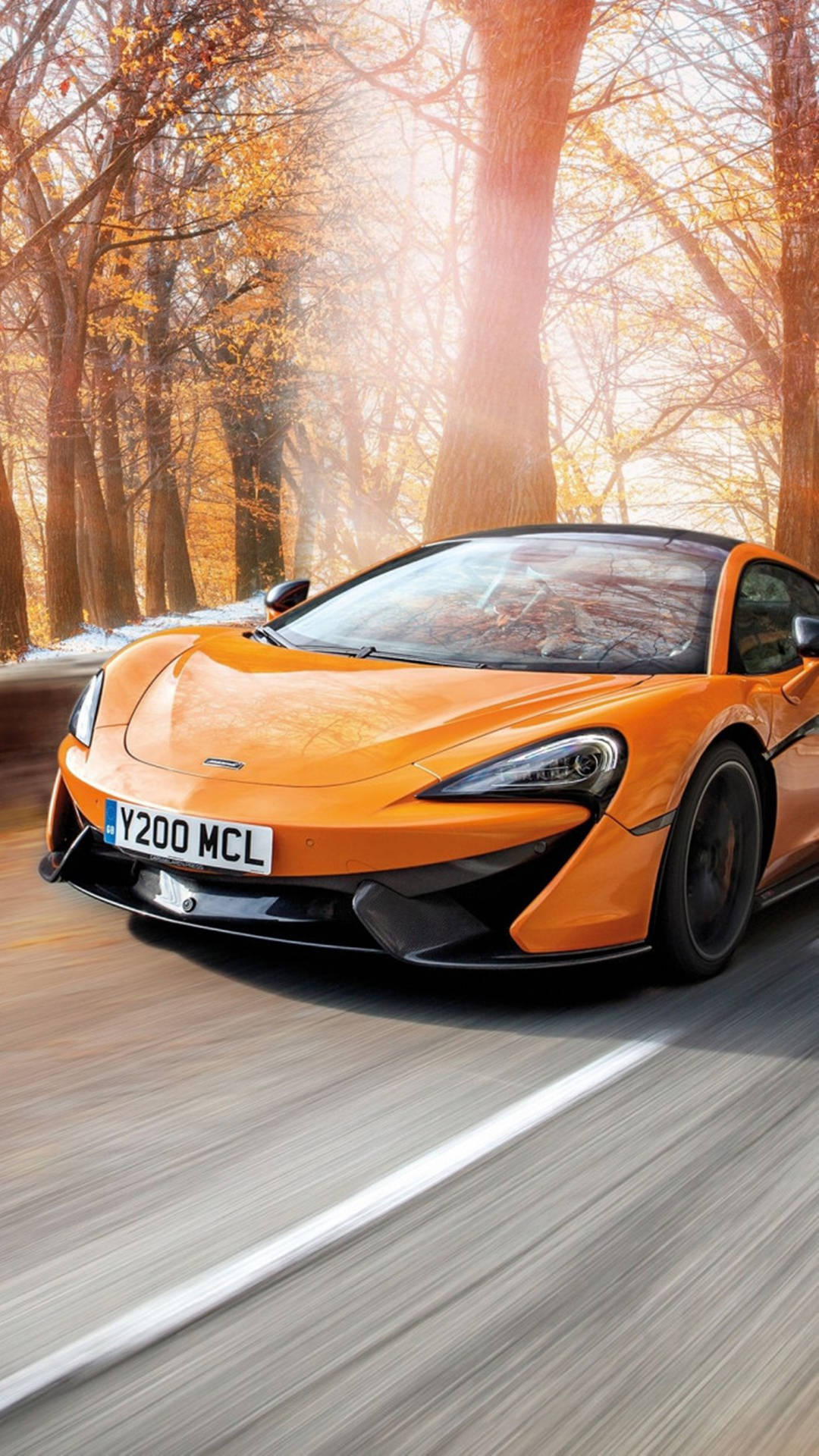 Exhilarating 2020 Orange Mclaren 570s Sports Car Wallpaper For Iphone