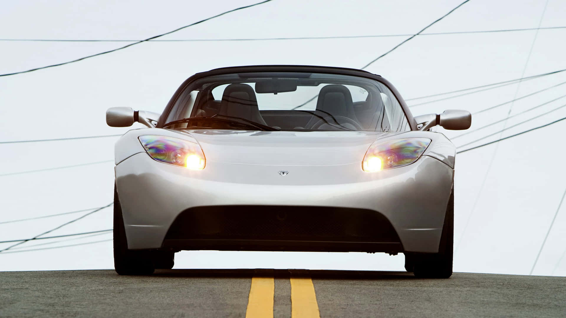 Exhilarating Speed - The Tesla Roadster Background