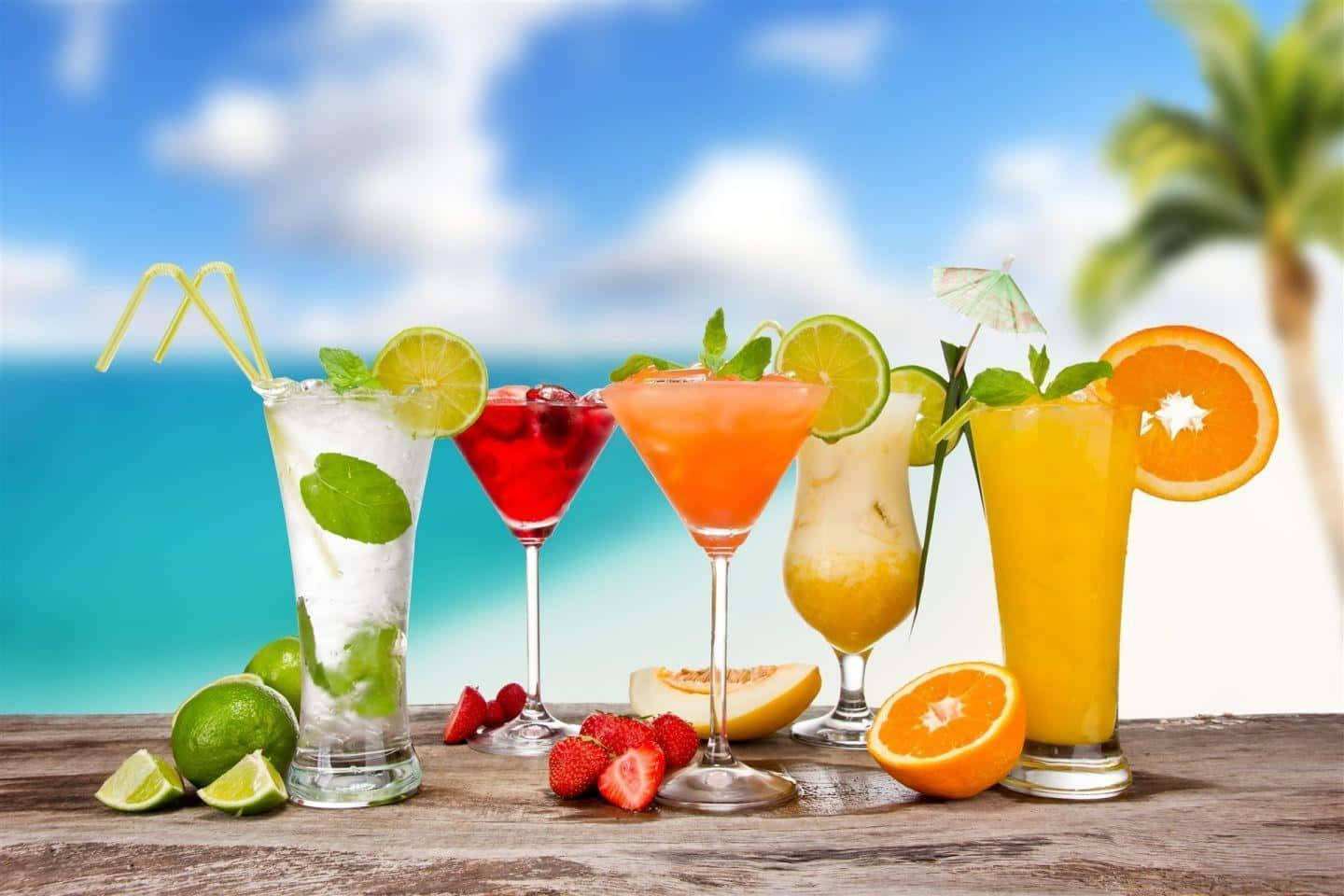 Exotic Juice Served In Fancy Cocktail Glasses Background