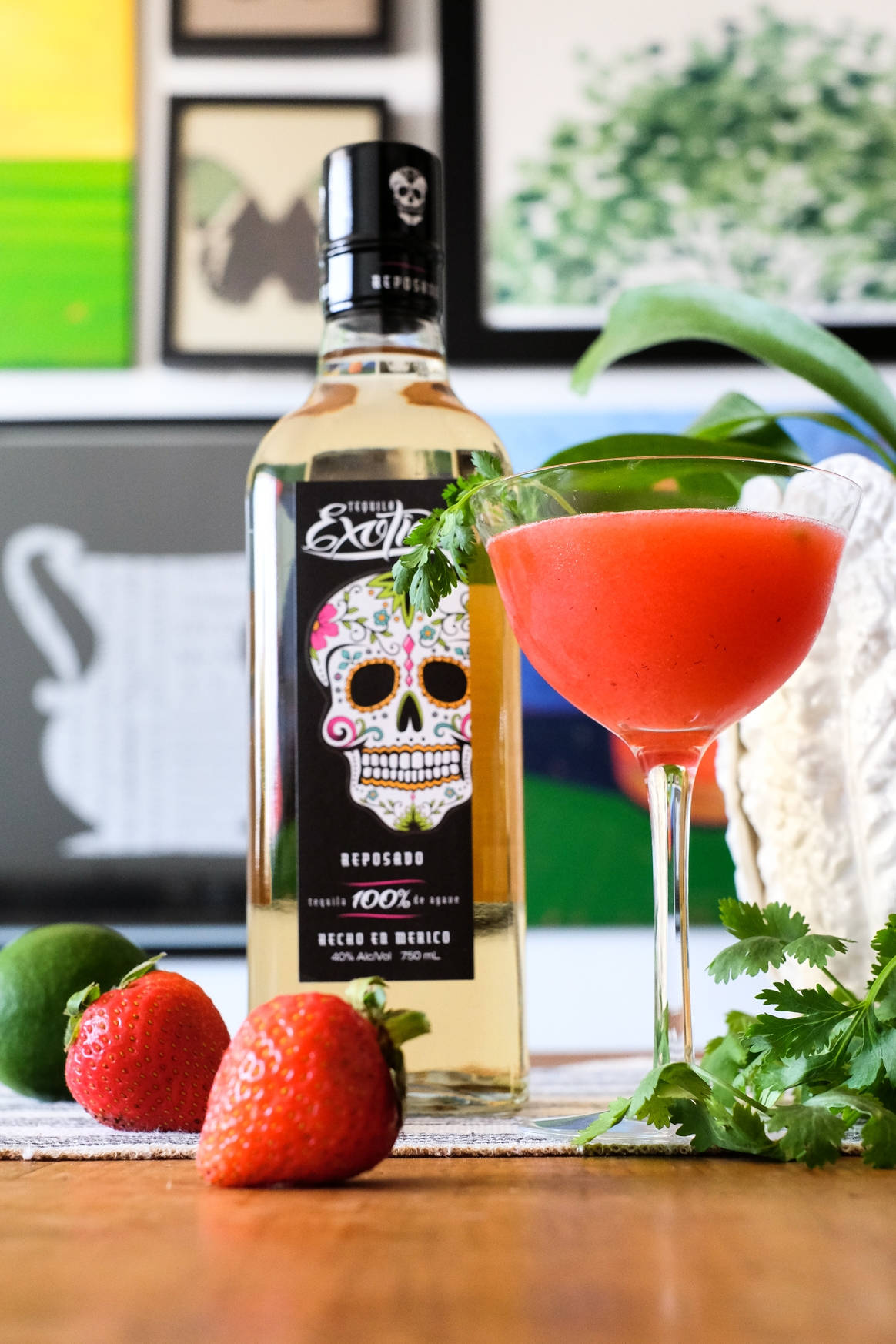 Exotico's Finest Tequila Served With Fresh Strawberries Background