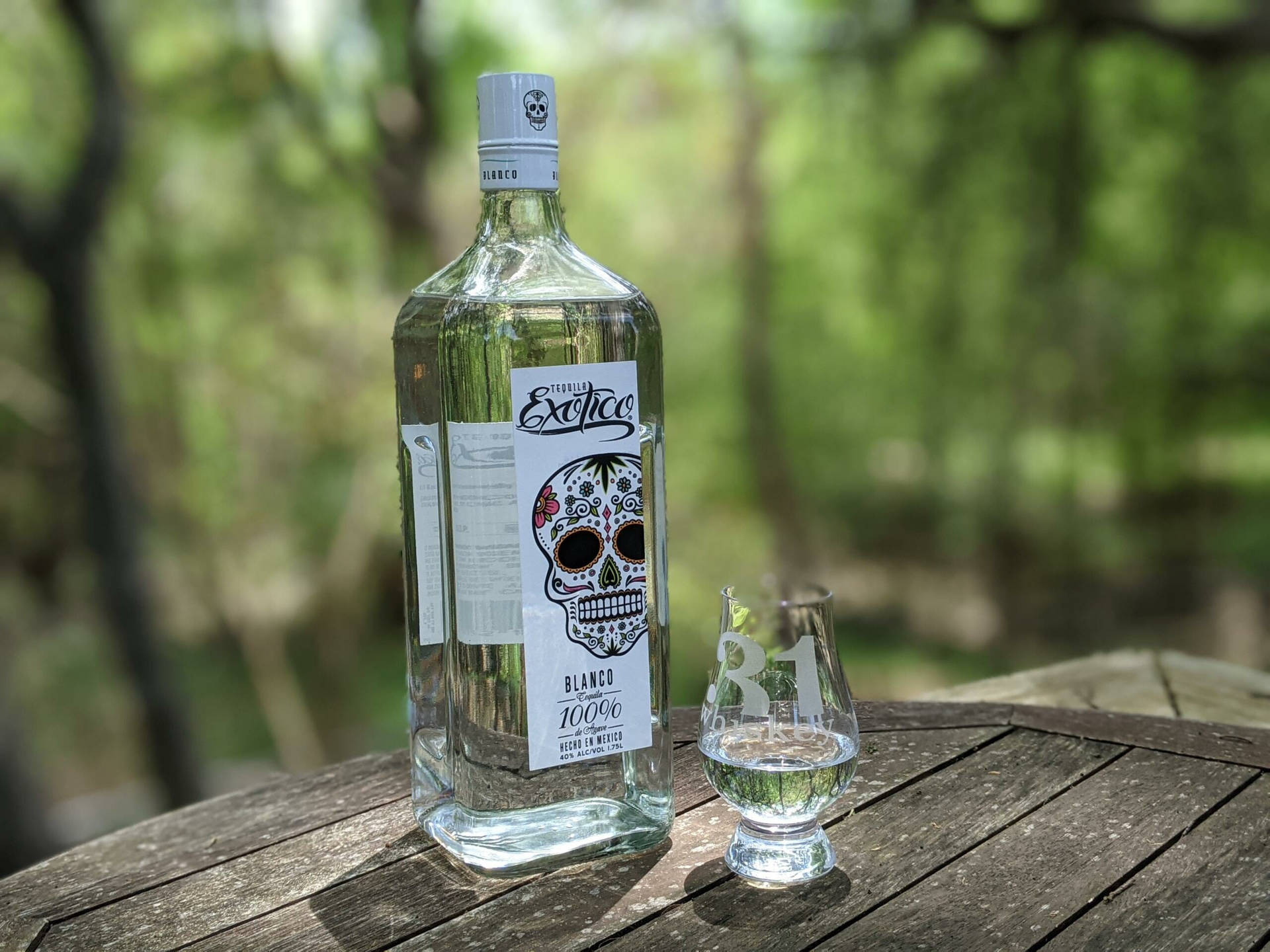 Exotico Tequila Blanco On Woods Background