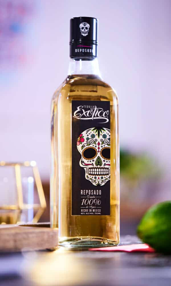 Exotico Tequila Reposado In Focus Background