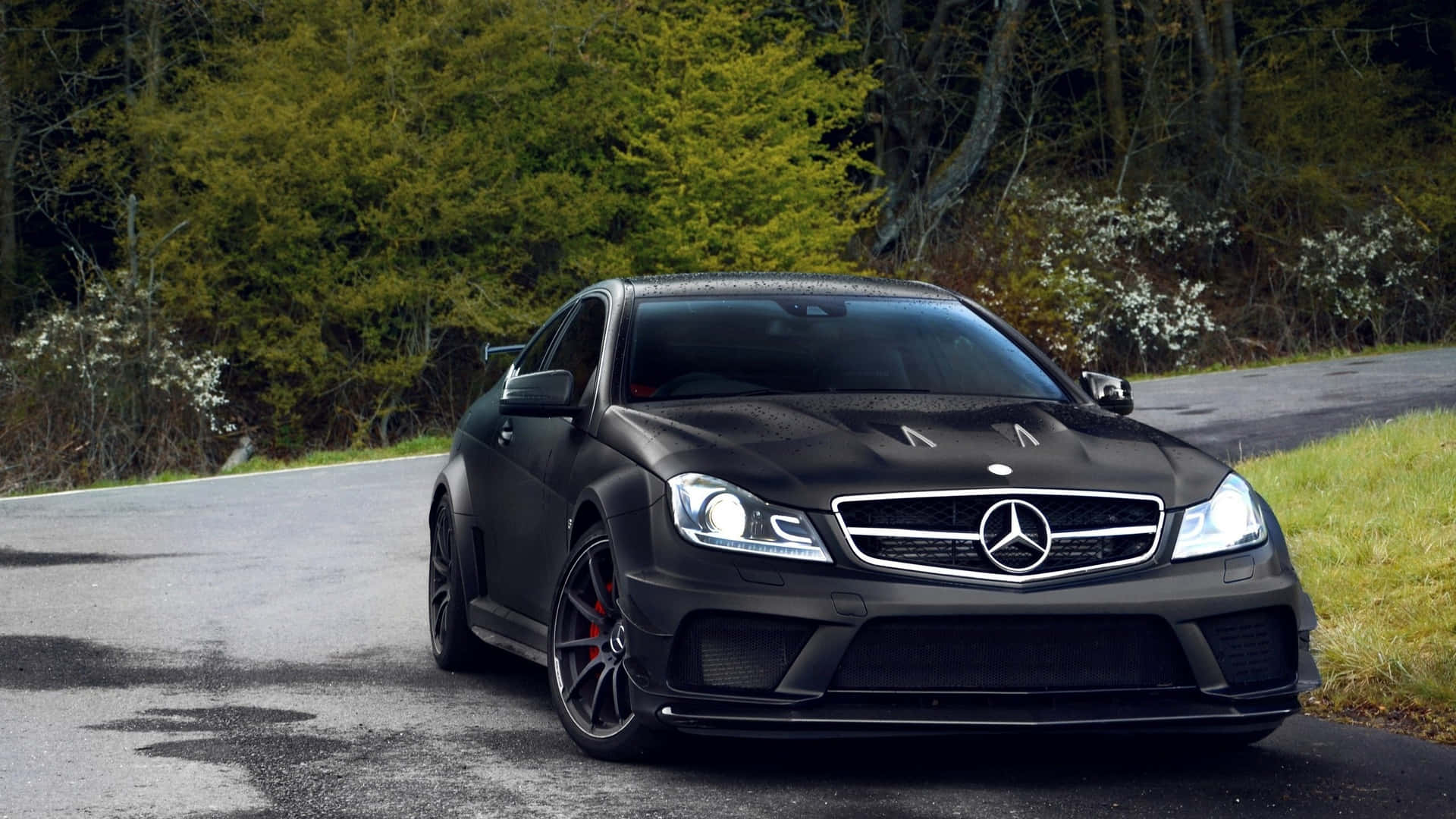 Expensive Black Mercedes Parked Background