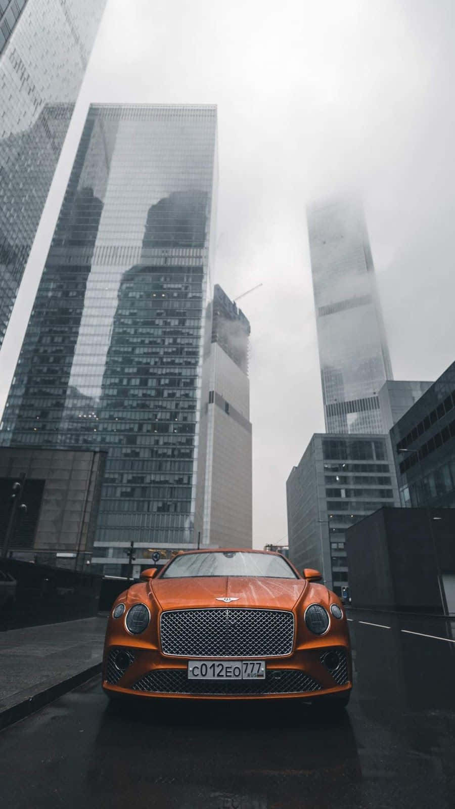 Expensive Orange Bentley
