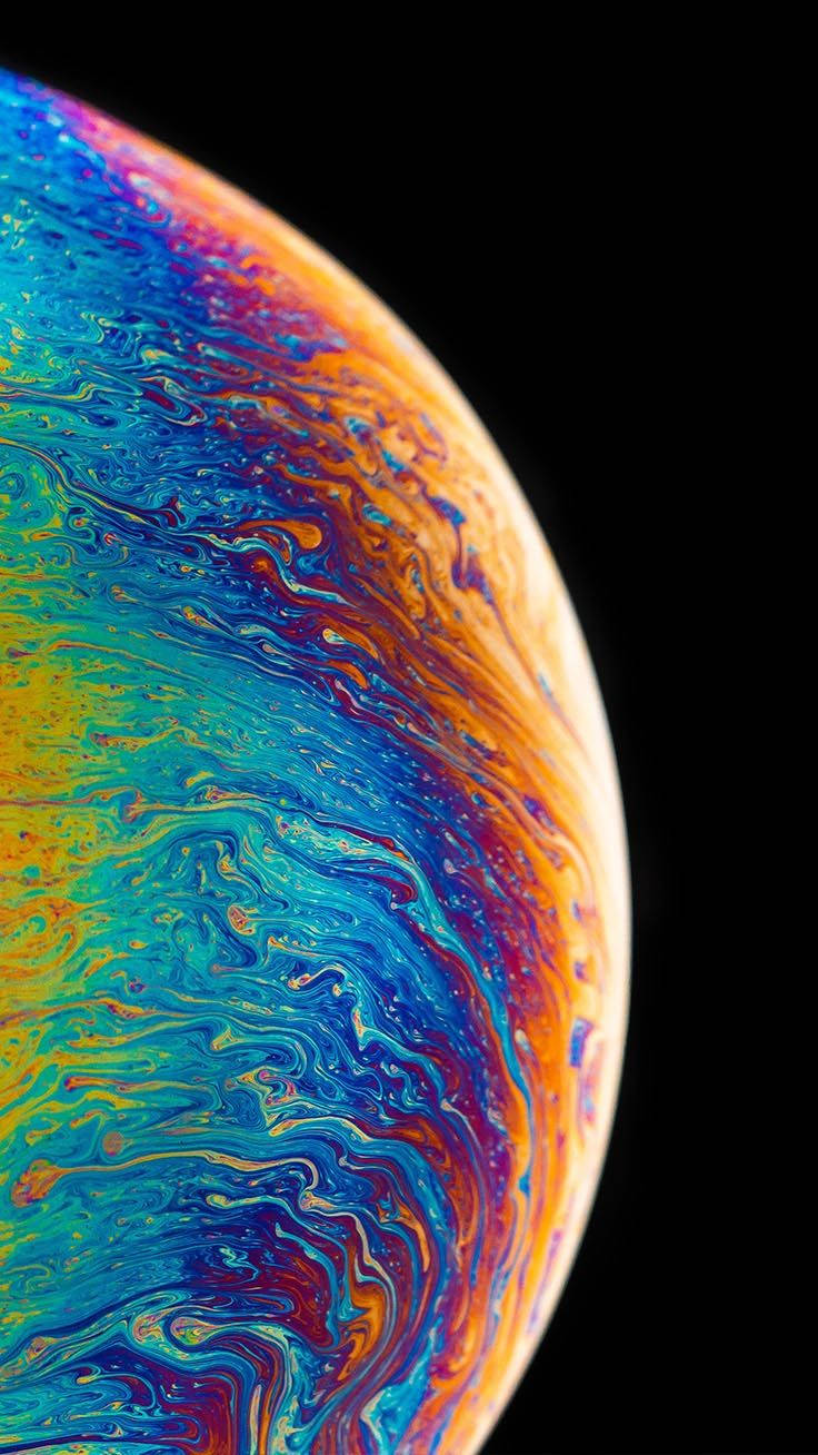 Experience An Out Of This World Landscape With Iphone Xs Planet Background