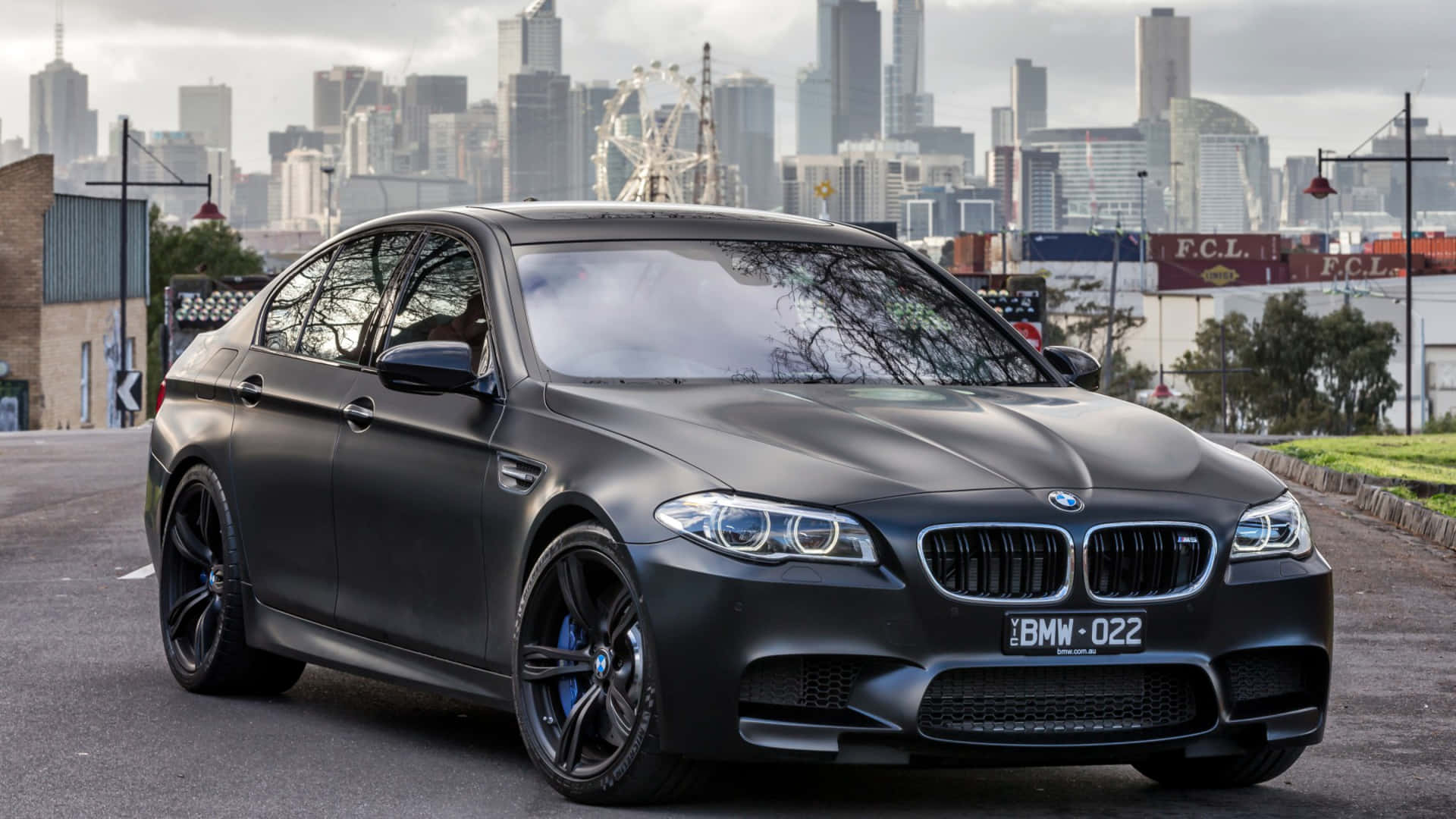 Experience Luxury And Power In The Bmw M5 Background