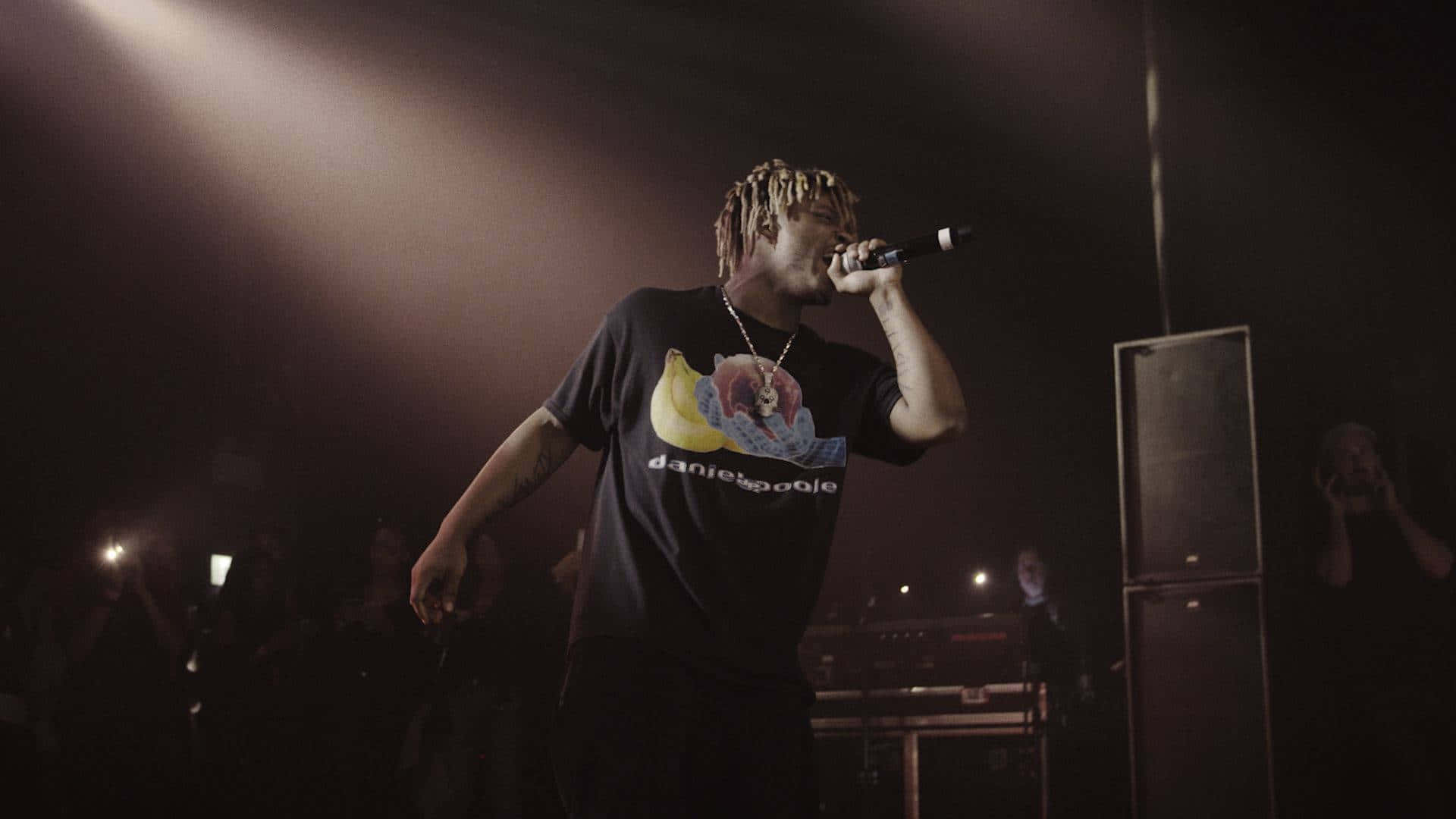 Experience The Best Of Juice Wrld At His Electrifying Concerts Background