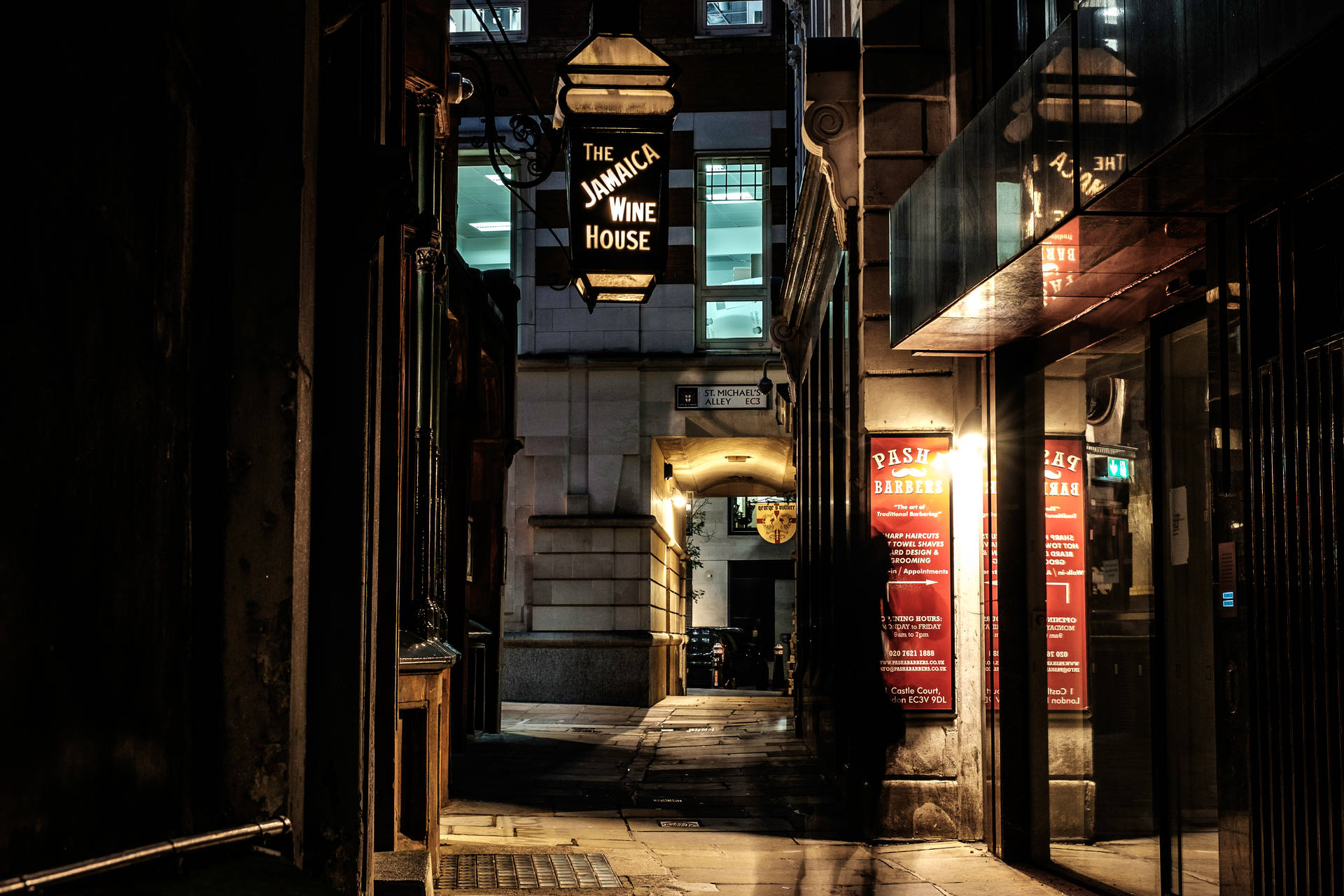 Experience The Hustle And Bustle Of City Life In This Street Alley At Night. Background