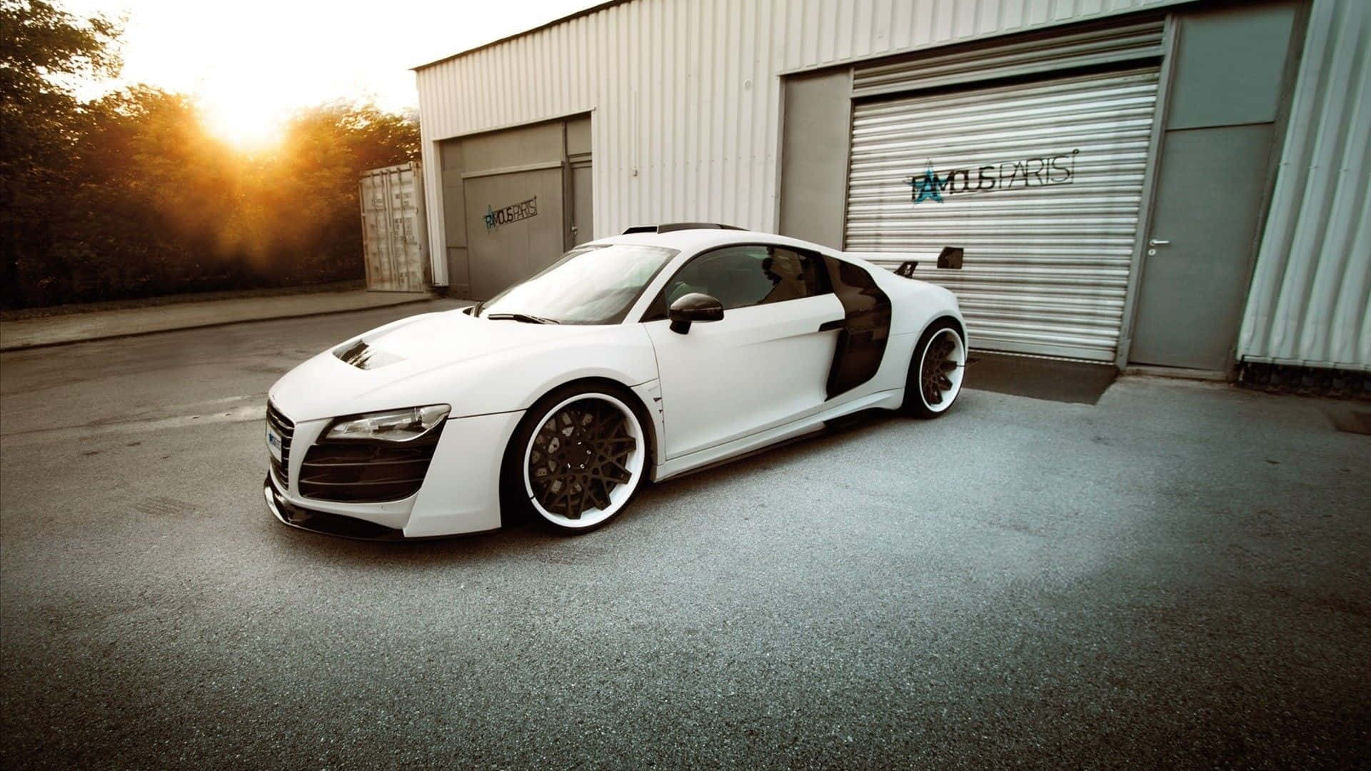 Experience The Luxury Of Driving An Hd Car Background