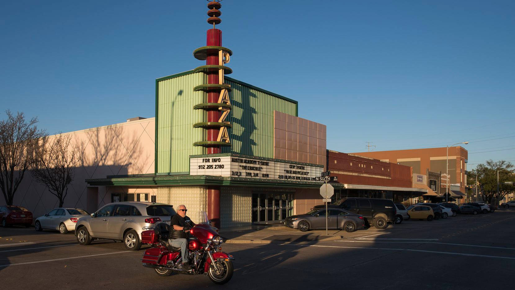 Experience The Magic At The Plaza Theater In Downtown Garland Background