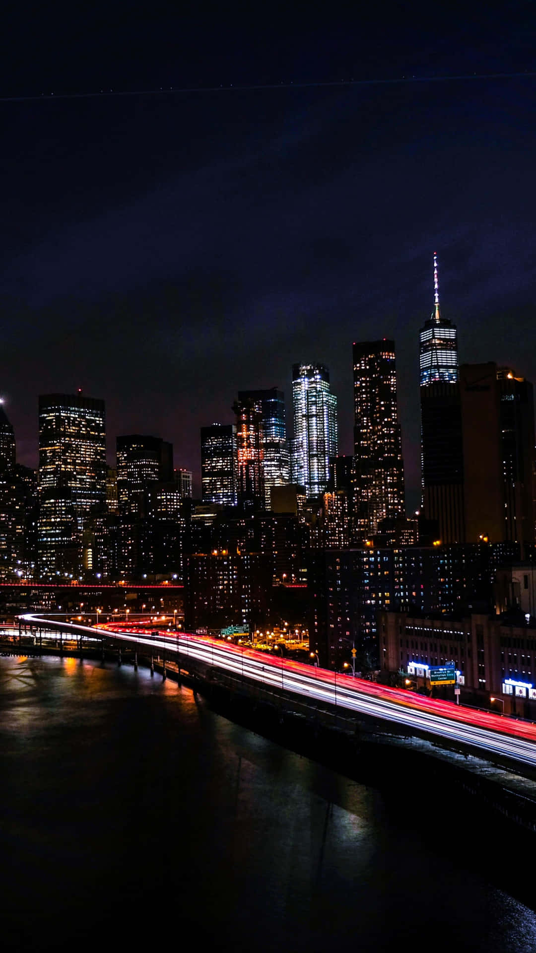 Experience The Magic Of Nyc At Nighttime With This New York City Night Iphone Background