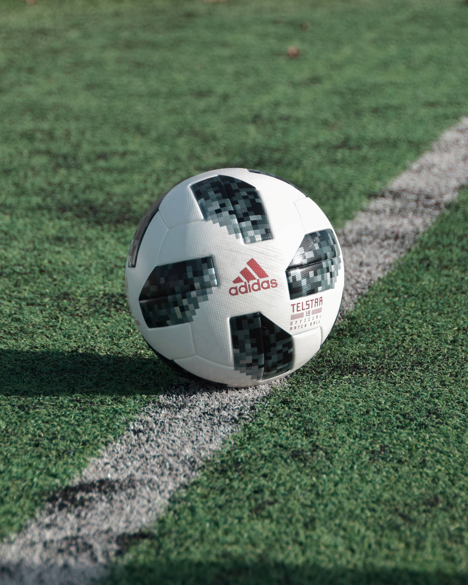 Experience The Magic Of The Fifa World Cup With The Official Match Ball From Adidas Background