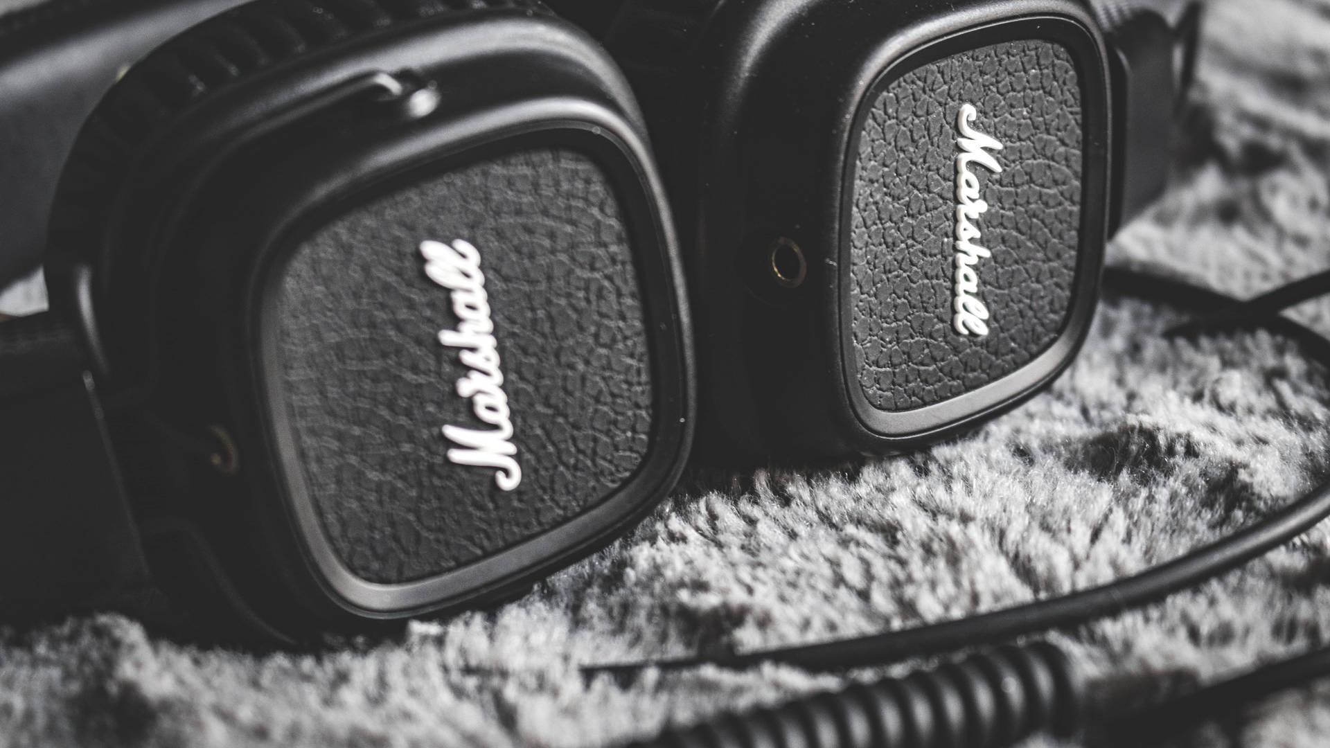 Experience The Power Of Music With Marshall Headphones Background