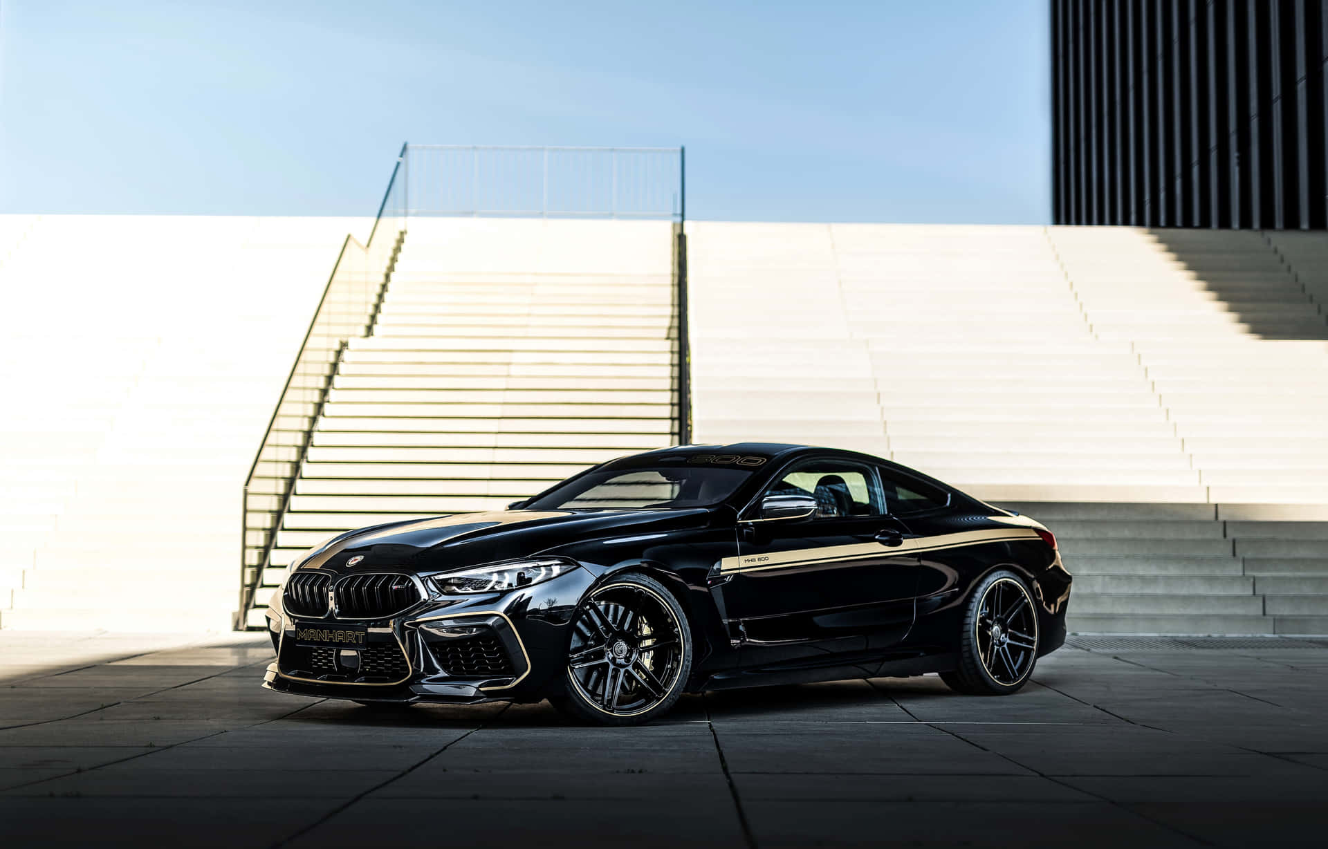 Experience The Thrill Of Driving A Bmw M8 Background