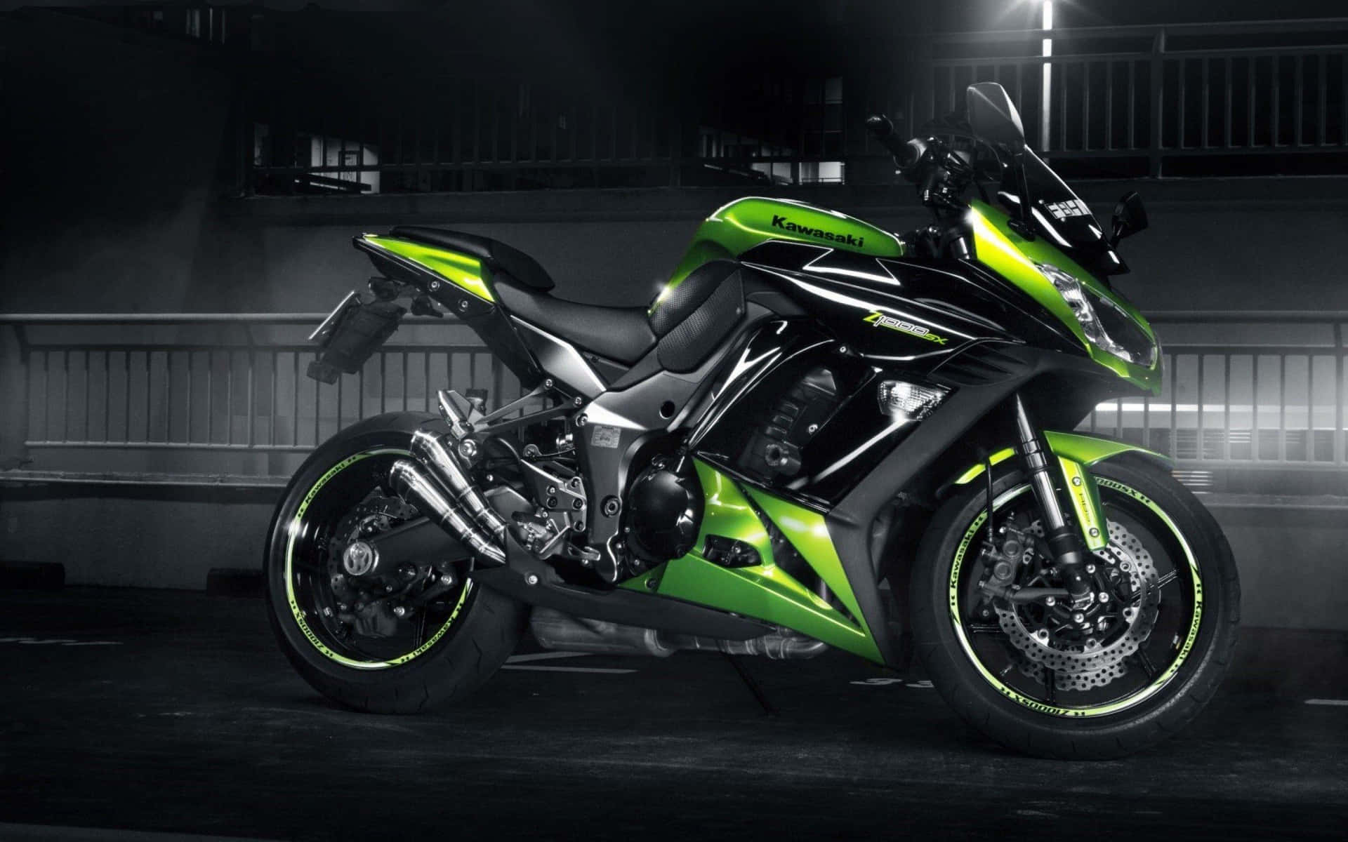 Experience The Thrill Of Riding A Kawasaki Desktop Background