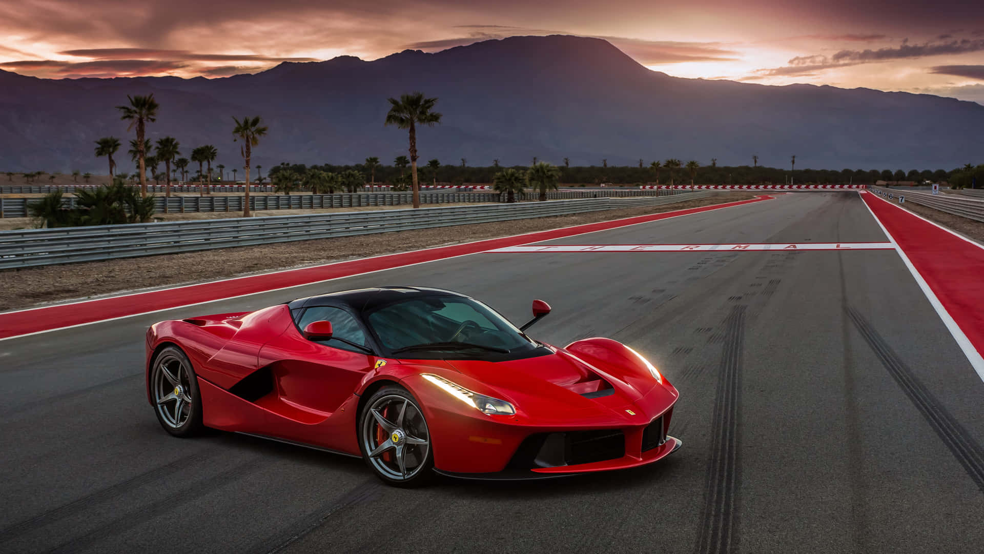 Experience The Thrill Of The Road With A Cool Ferrari Background