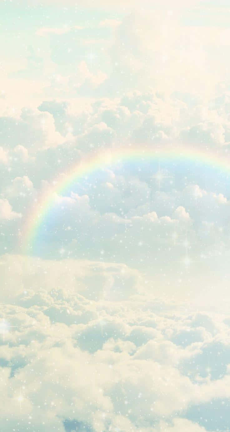 Experience The Vibrant Colors Of A Beautiful Pastel Rainbow On Your Iphone Background