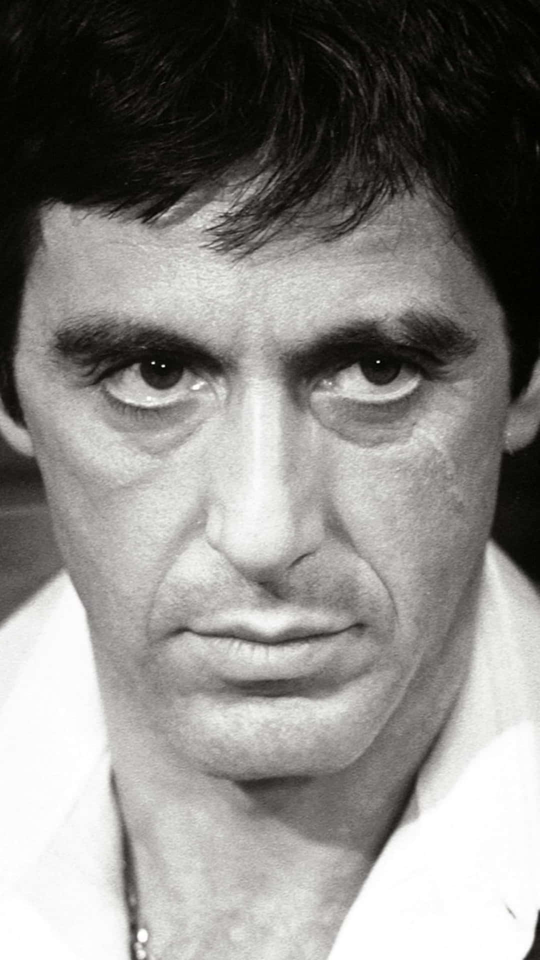 Experience The World Of Scarface On Your Iphone Background