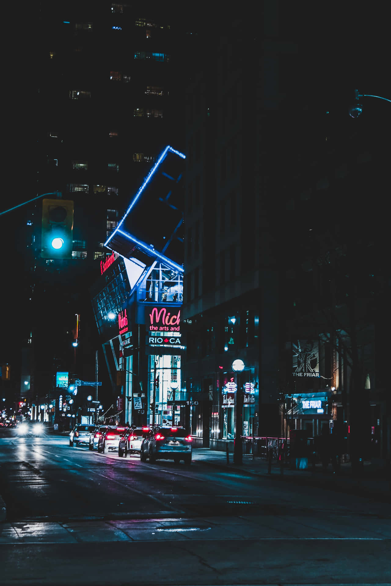 Explore The Bright Lights And Energy Of A Neon-lit City. Background