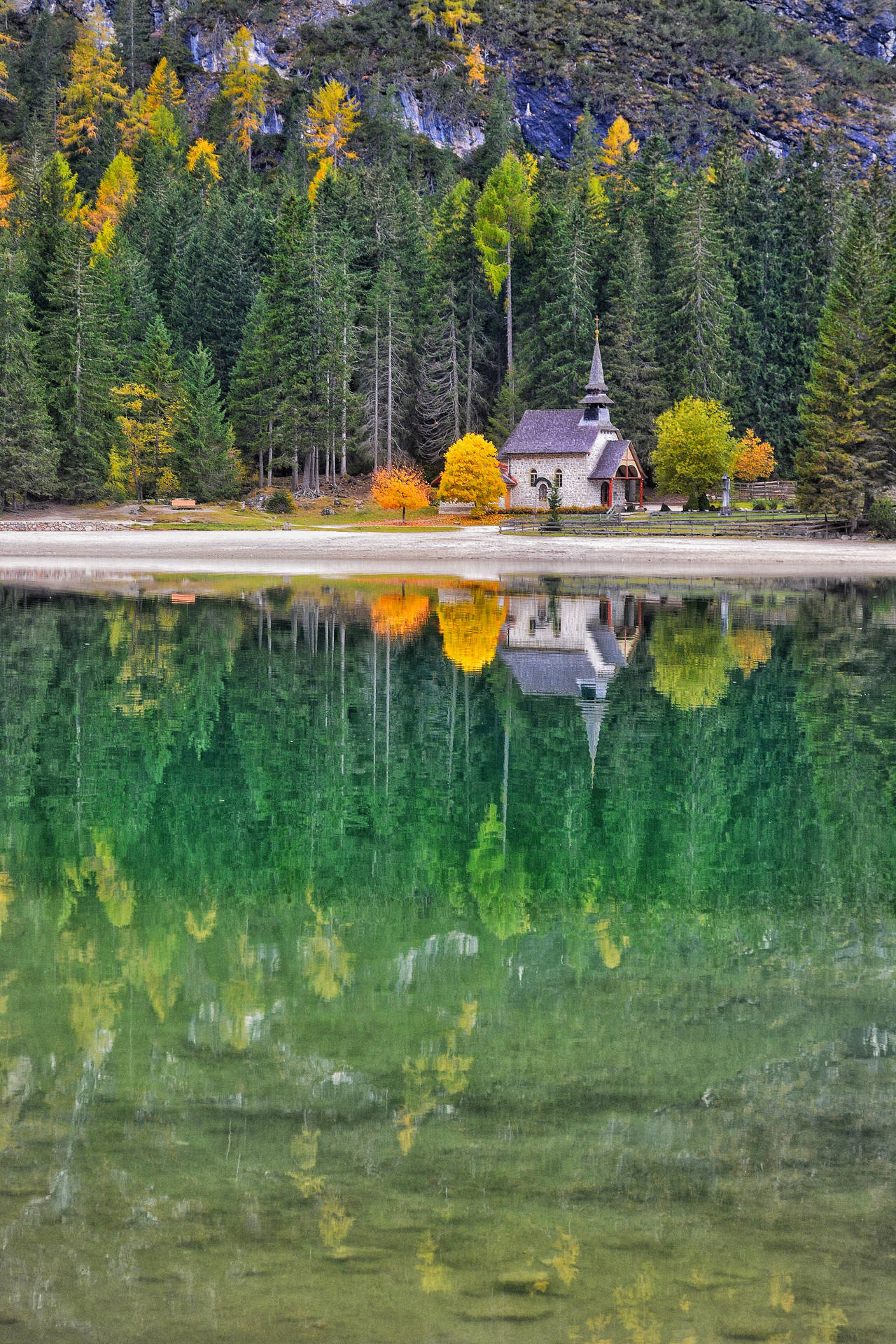 Explore The Castle And Its Autumn Reflection Background