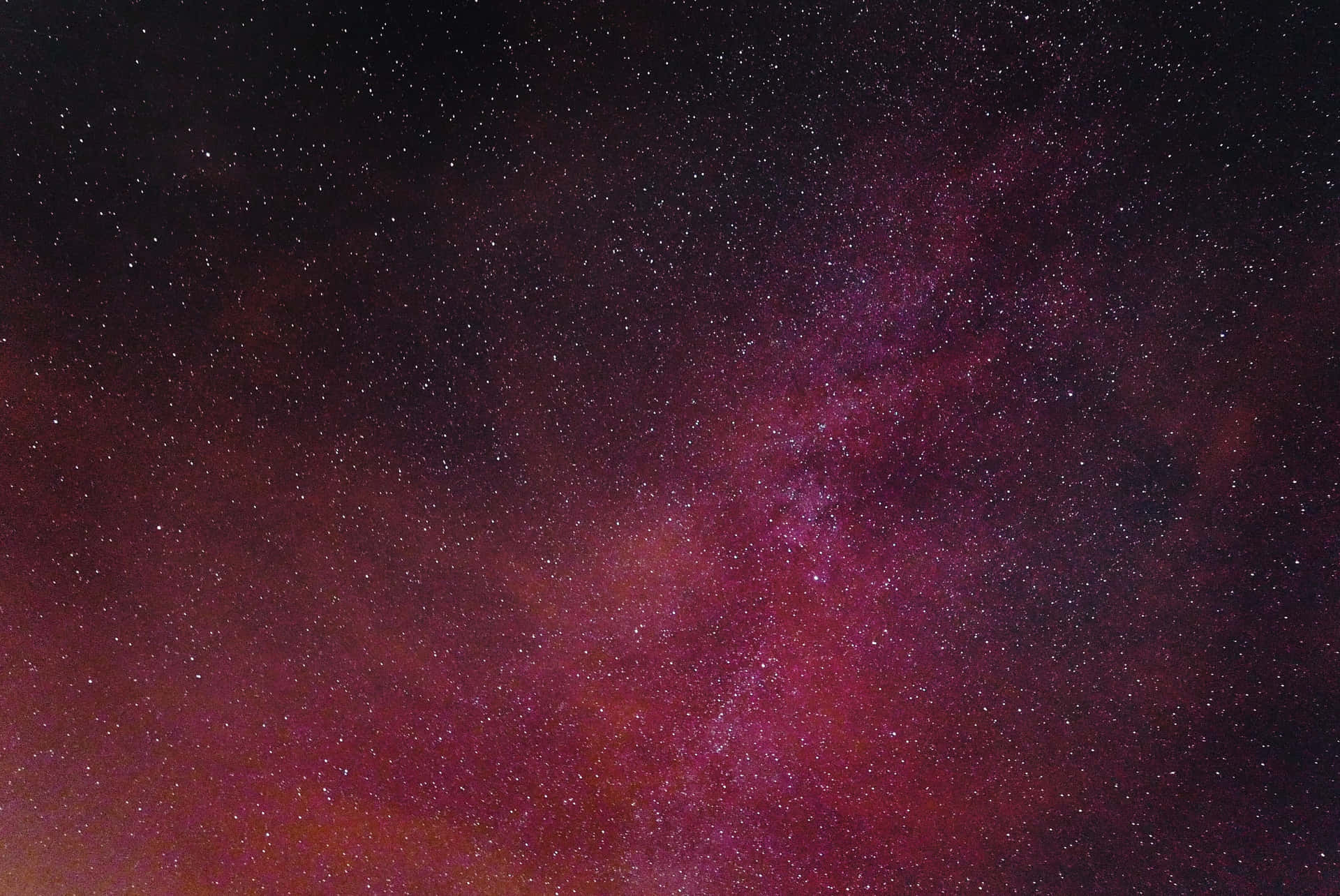 Explore The Cosmic Splendor Of The Universe With Pink Space Wallpaper
