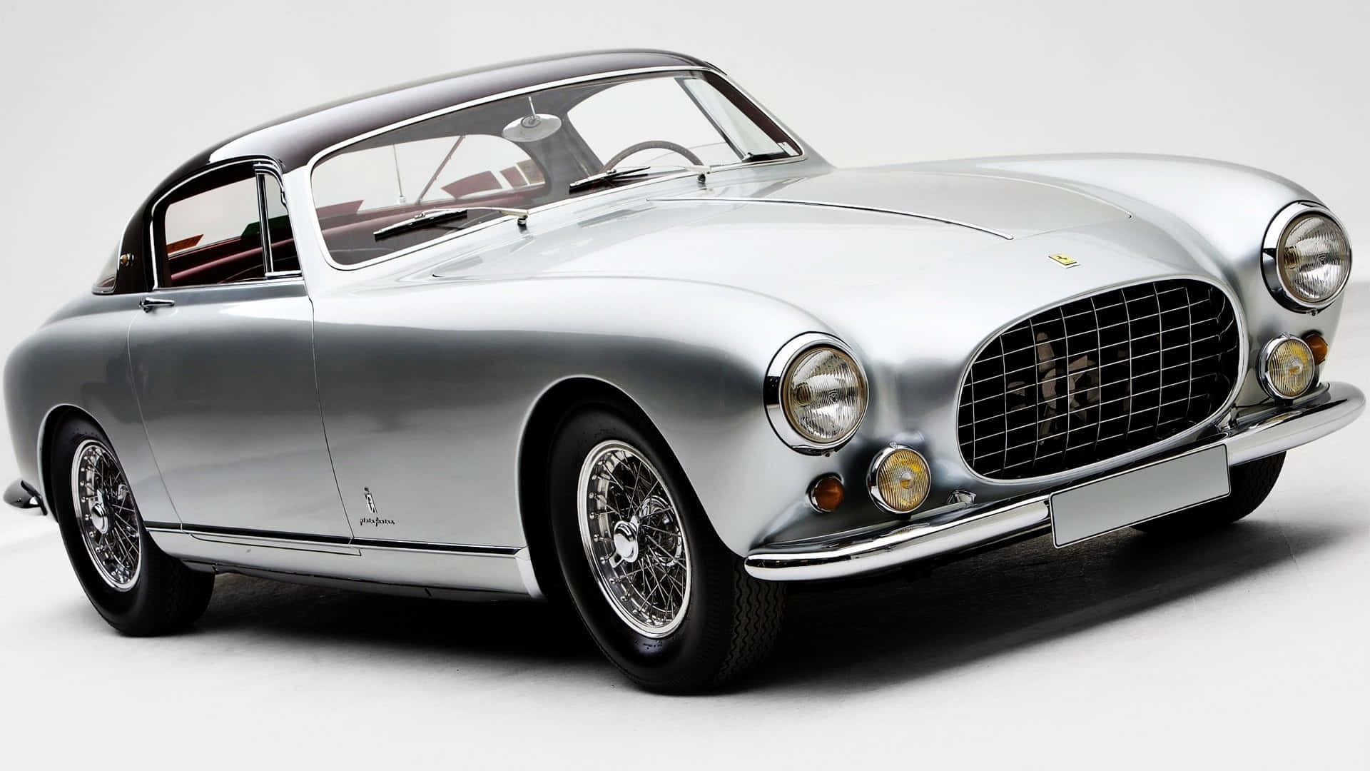 Explore The Open Road In The Iconic Classic Ferrari. Background