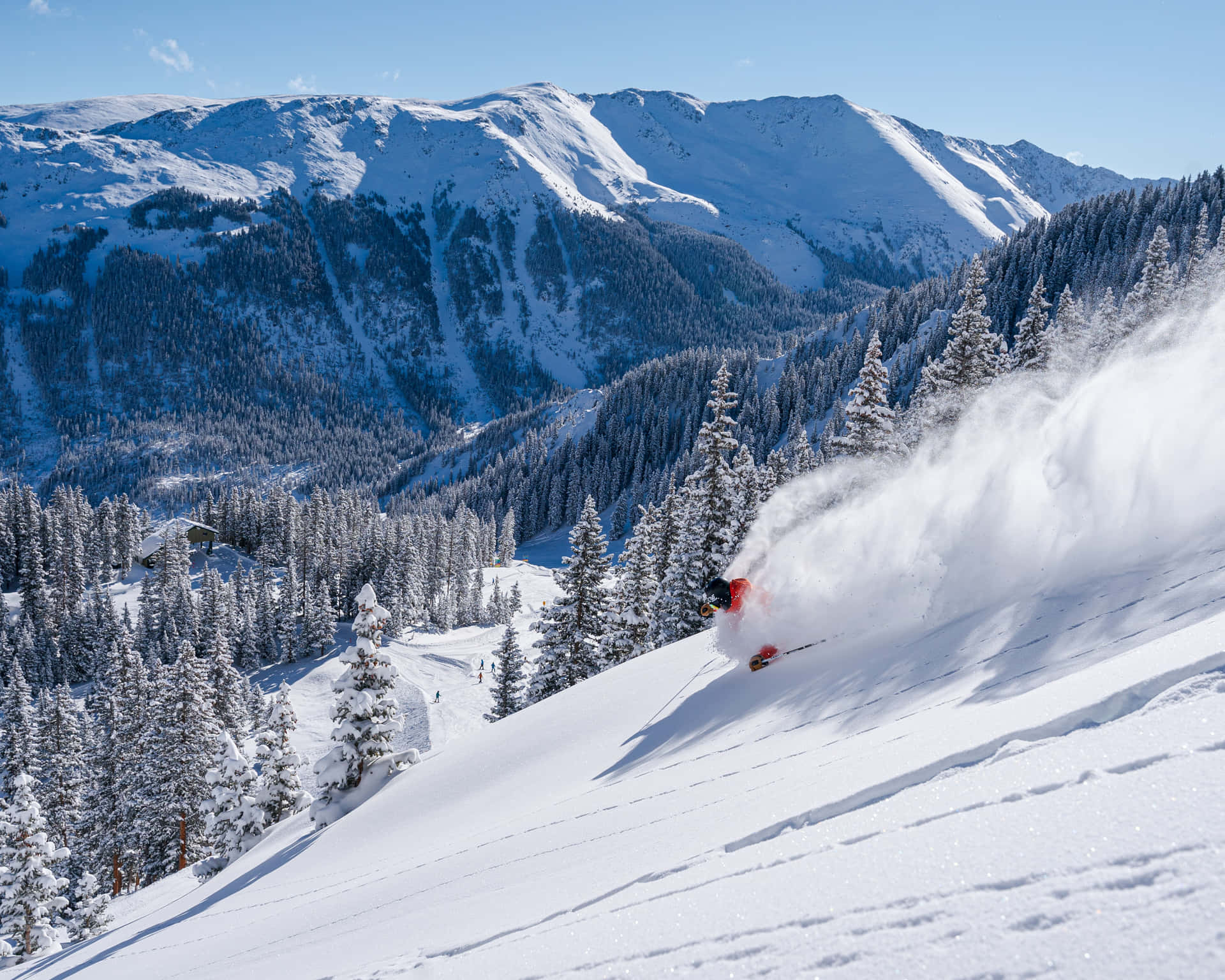 Explore The Scenic Beauty Of A Ski Mountain Background