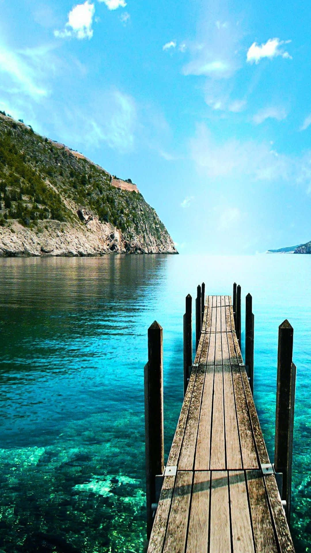 Explore The Serene Beauty Of A Peaceful Lake Background